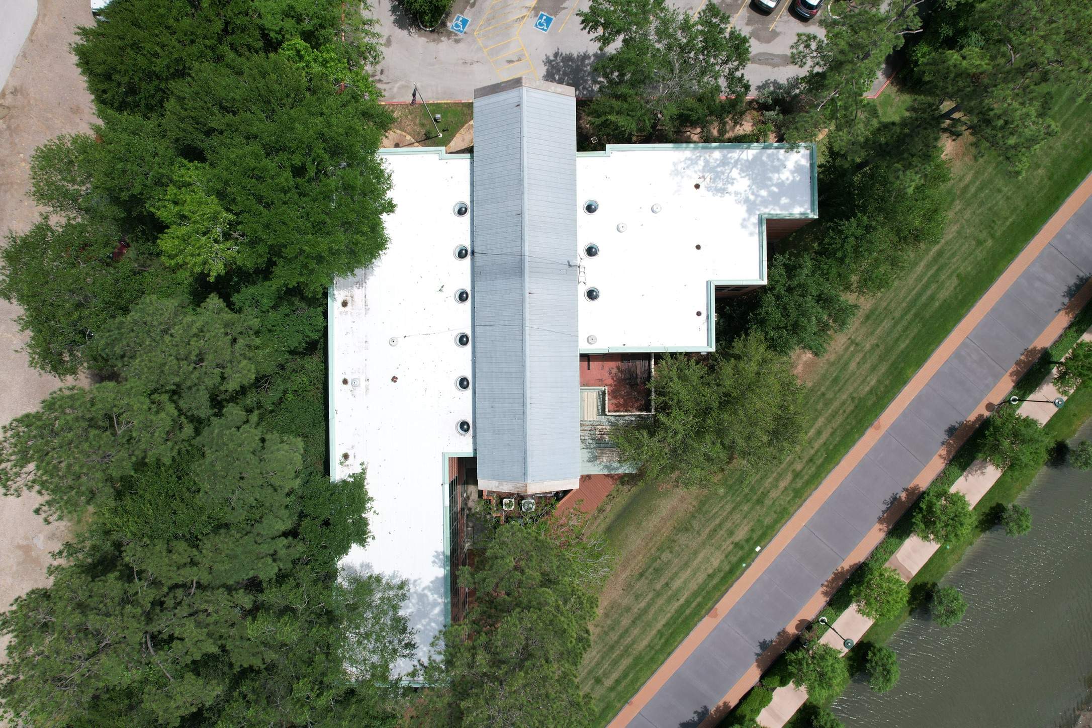 Commercial Roofing Restoration using GAF Unisil Silicone by STX Roofing