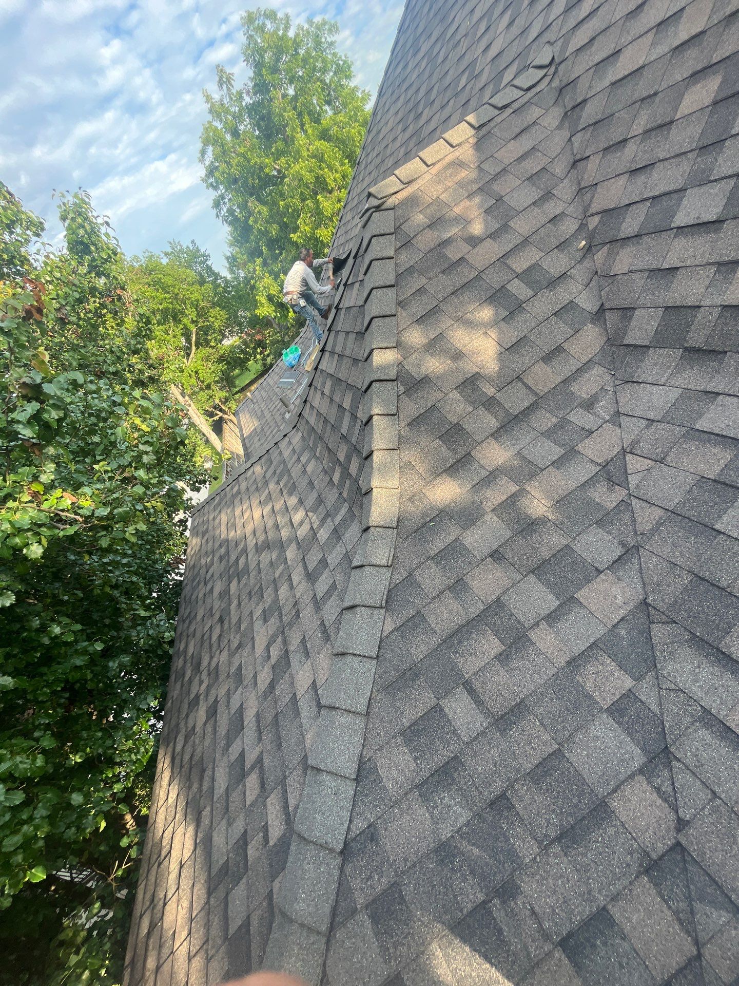 Tan exterior with IKO Driftshake by Tejas Roofworks + Restoration