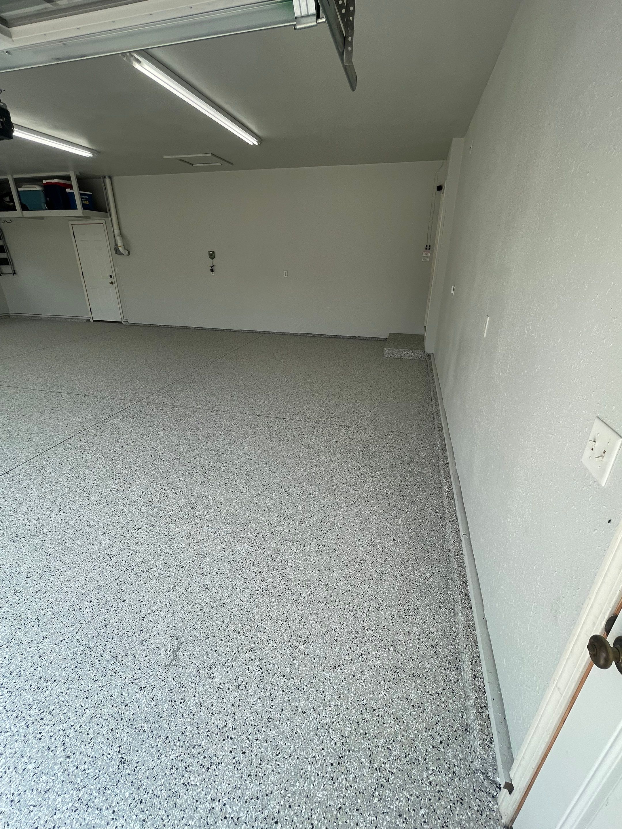 Multi-Car Garage Floor Coating and Crack Repair in Tea by Select Painting, Coatings & Garage Cabinets
