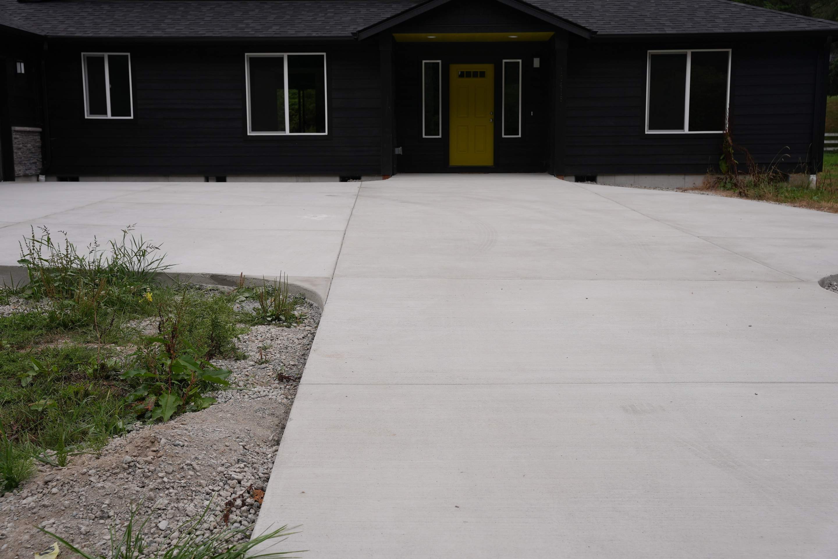 Lauren | Concrete Driveway, Back Patio & Asphalt Patch Repair  by Jireh Asphalt & Concrete Inc 