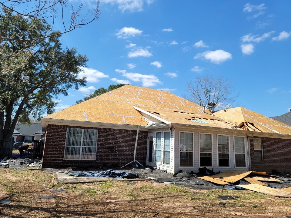 Residential Roofing Installation using Roof Replacement by American Roofing & Construction LLC