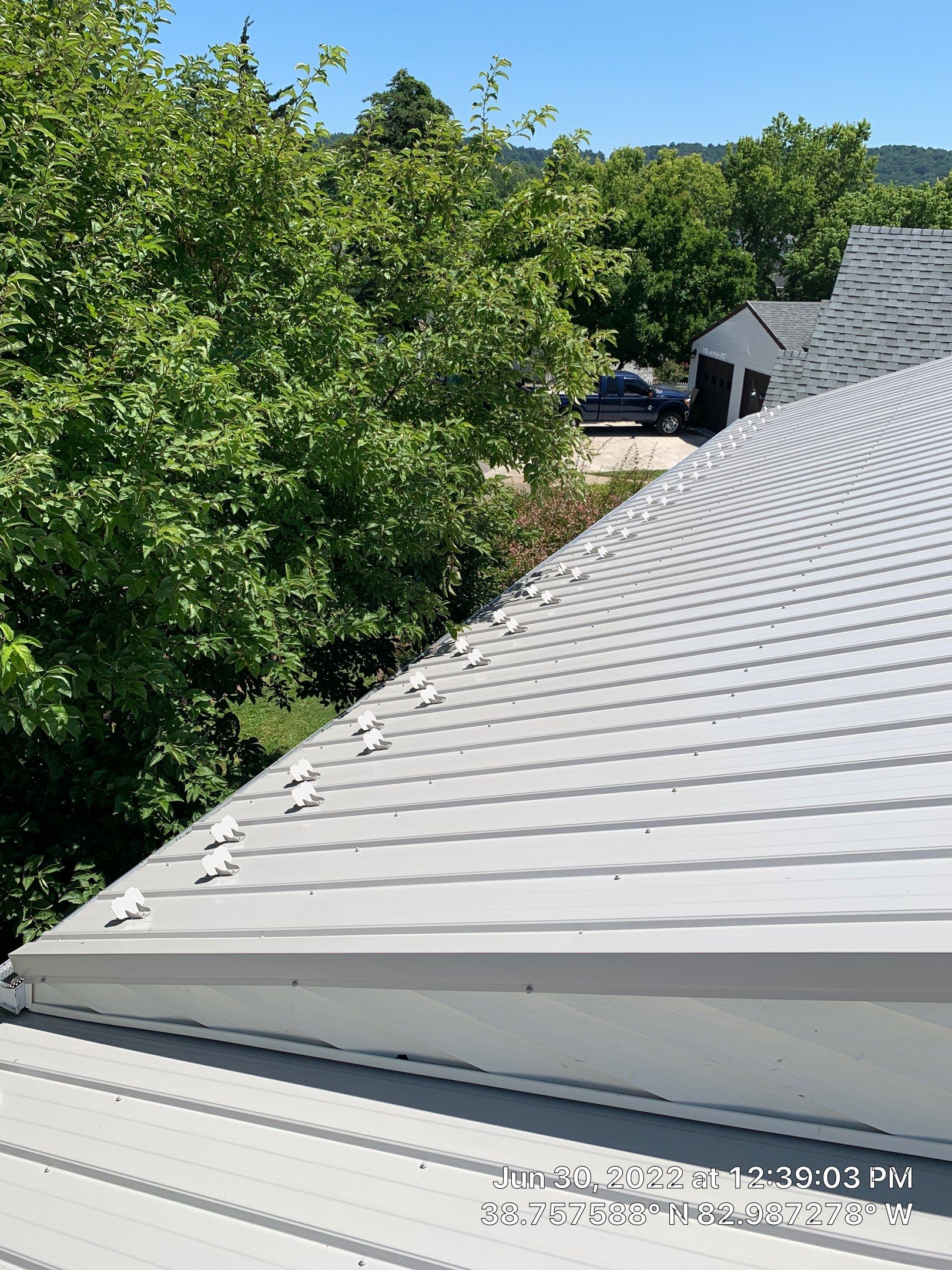 Metal Roofing, Skylights, Porch Build by Secure Construction Company Inc