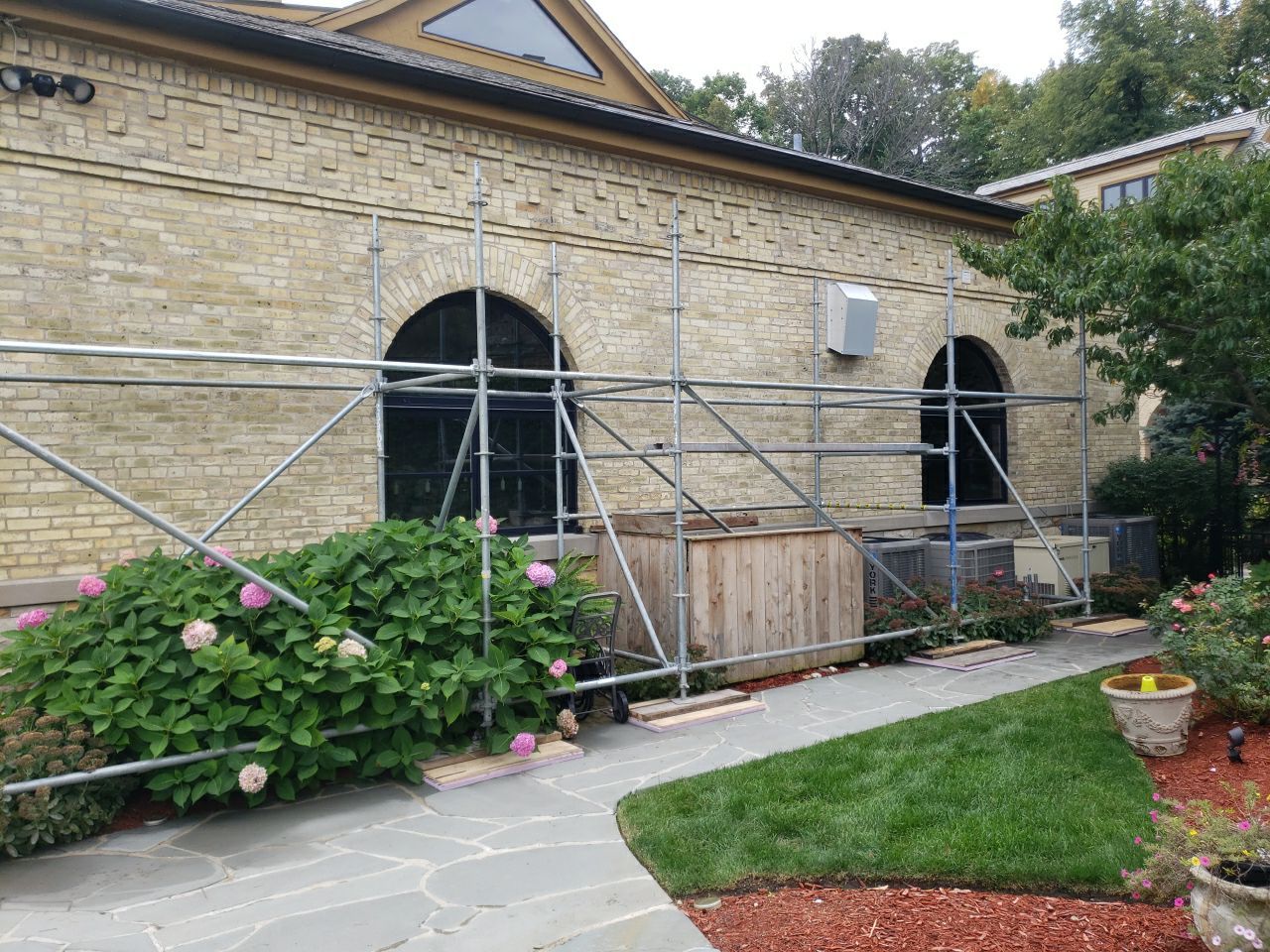 Slate Roof Replacement and Half Round Copper Gutter Installation by Custom Installations