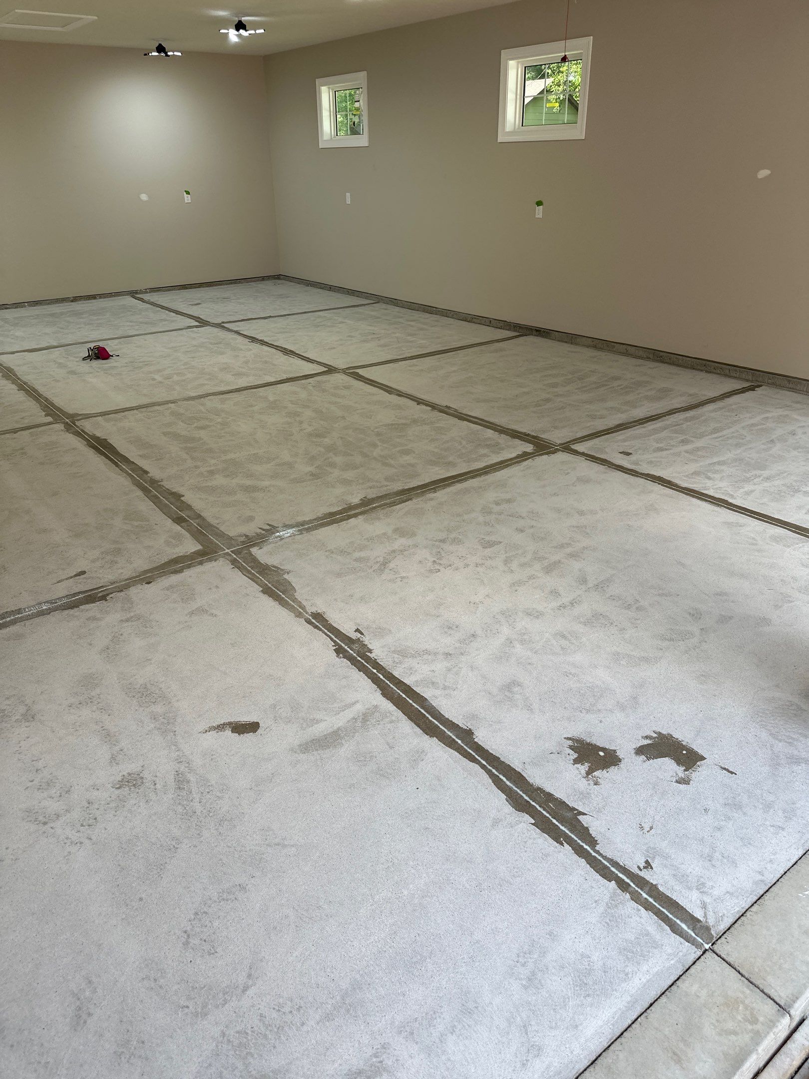 GO BIG RED: Custom Flake Epoxy Garage Floor in Lincoln by Goat Coatings