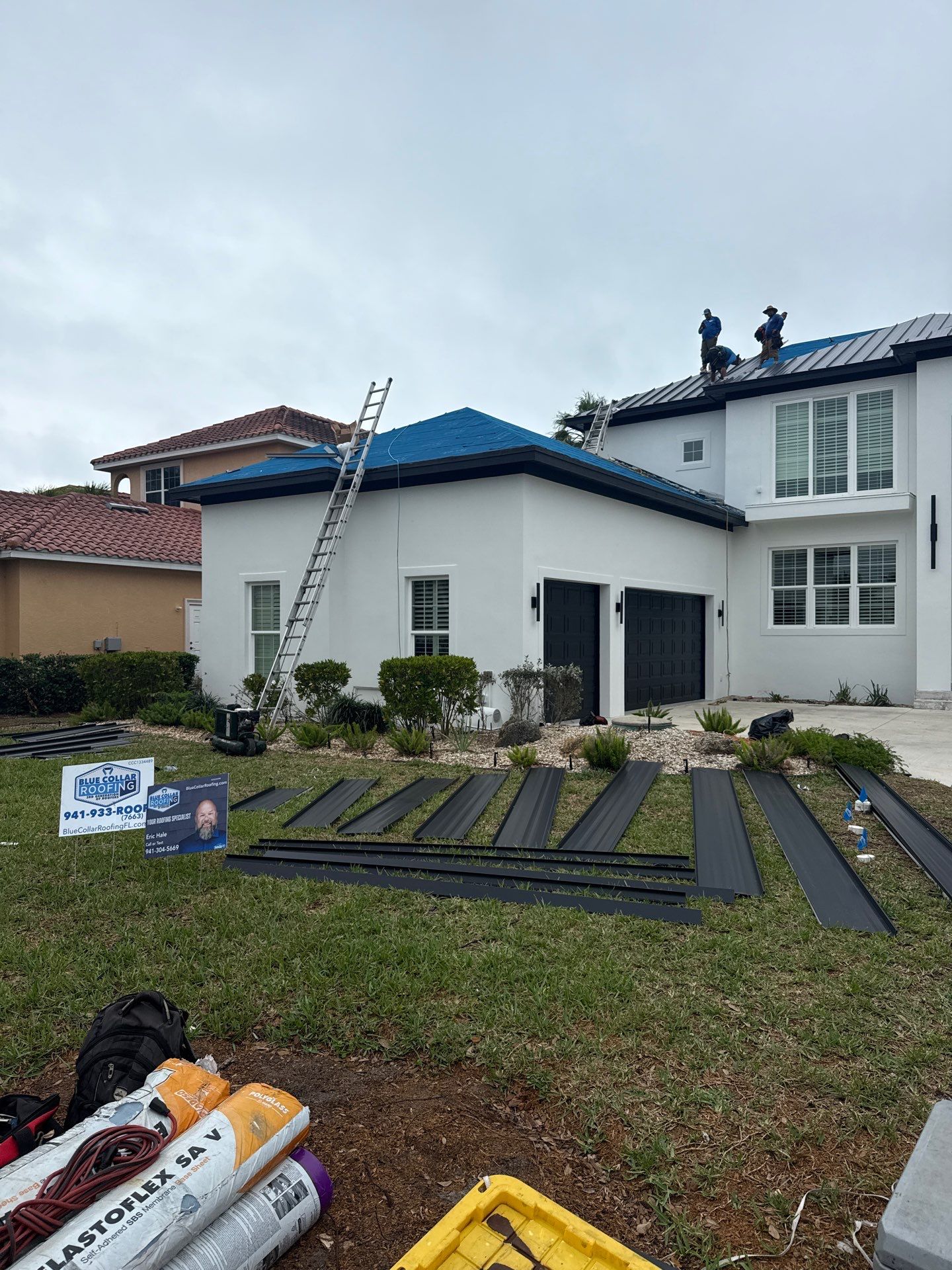 Soffit and Fascia Installation and black seamless gutters in Sarasota FL by Gutter Professors