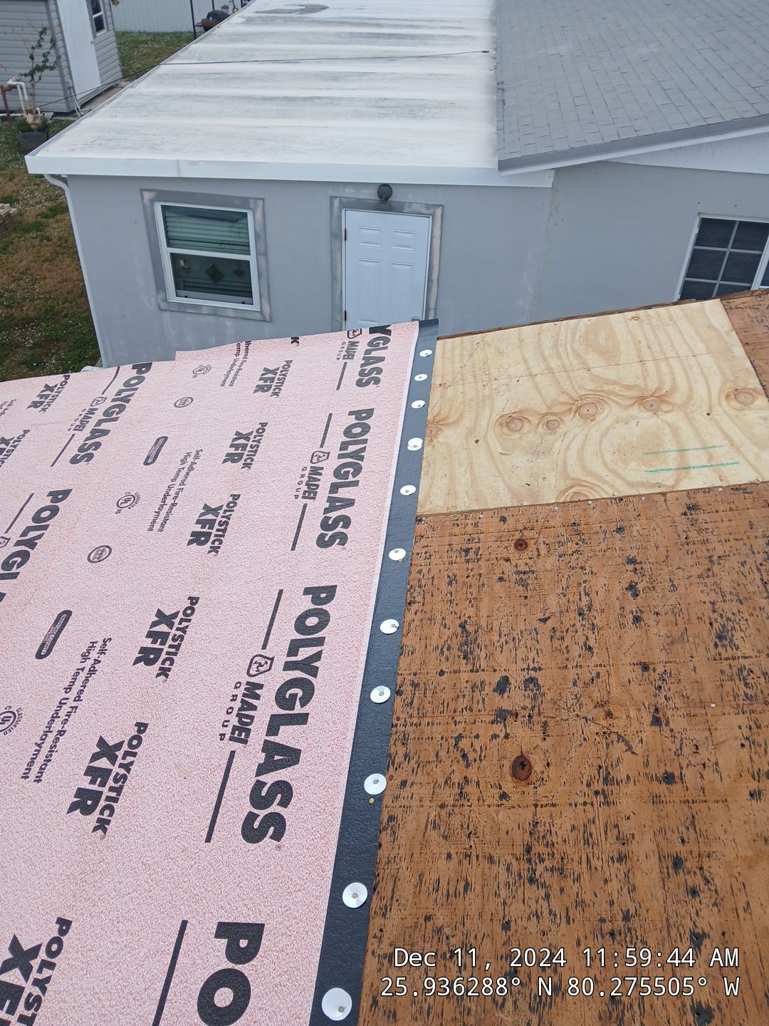 RESIDENTAL METAL REROOF 24 GUAGE DOVE GRAY 1-1/2" MECHANICAL SEAM METAL POLYGLASS POLYSTICK XFR by Earl W. Johnston Roofing 