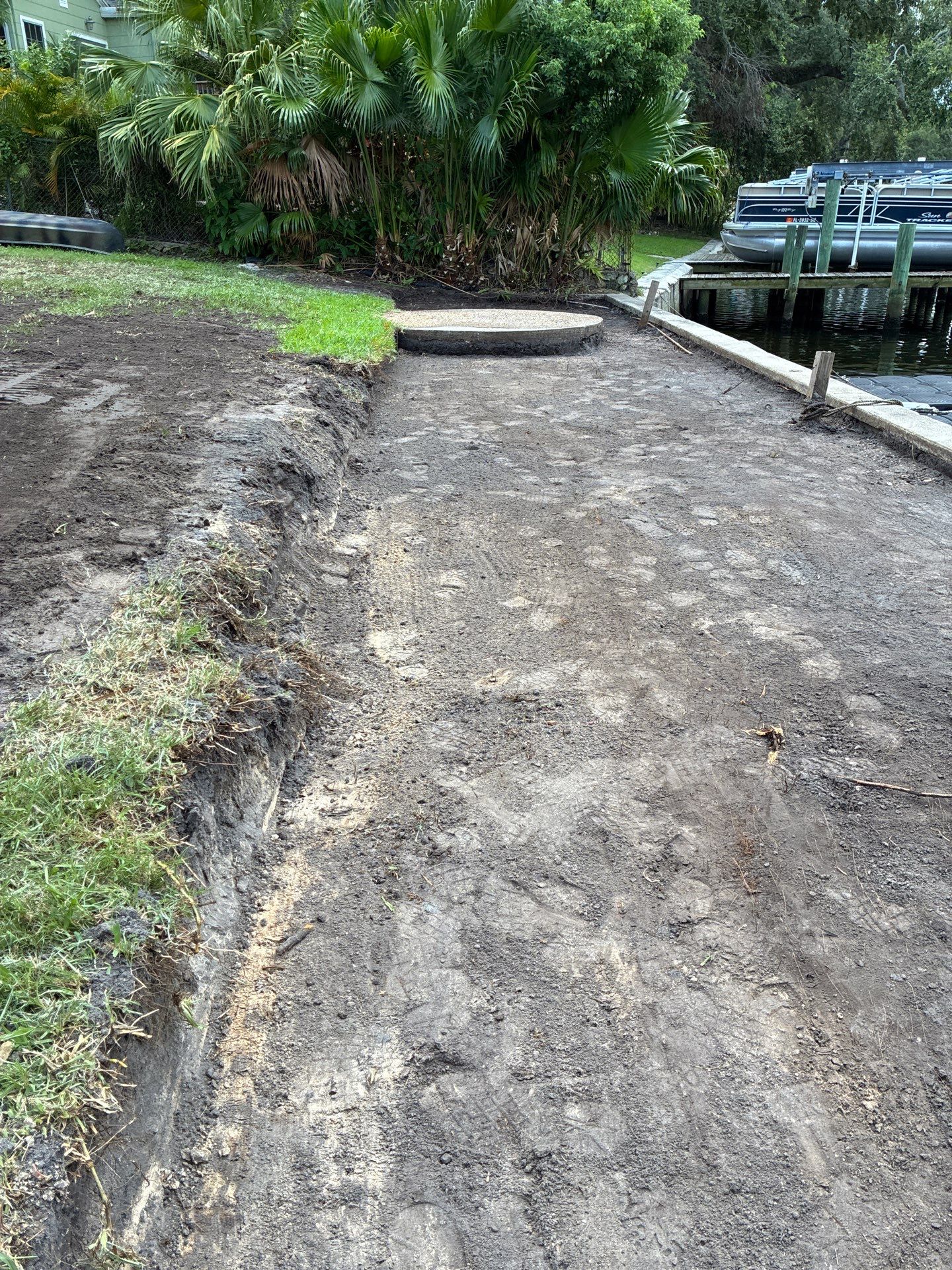 Grading back yard oasis by Level One Grading