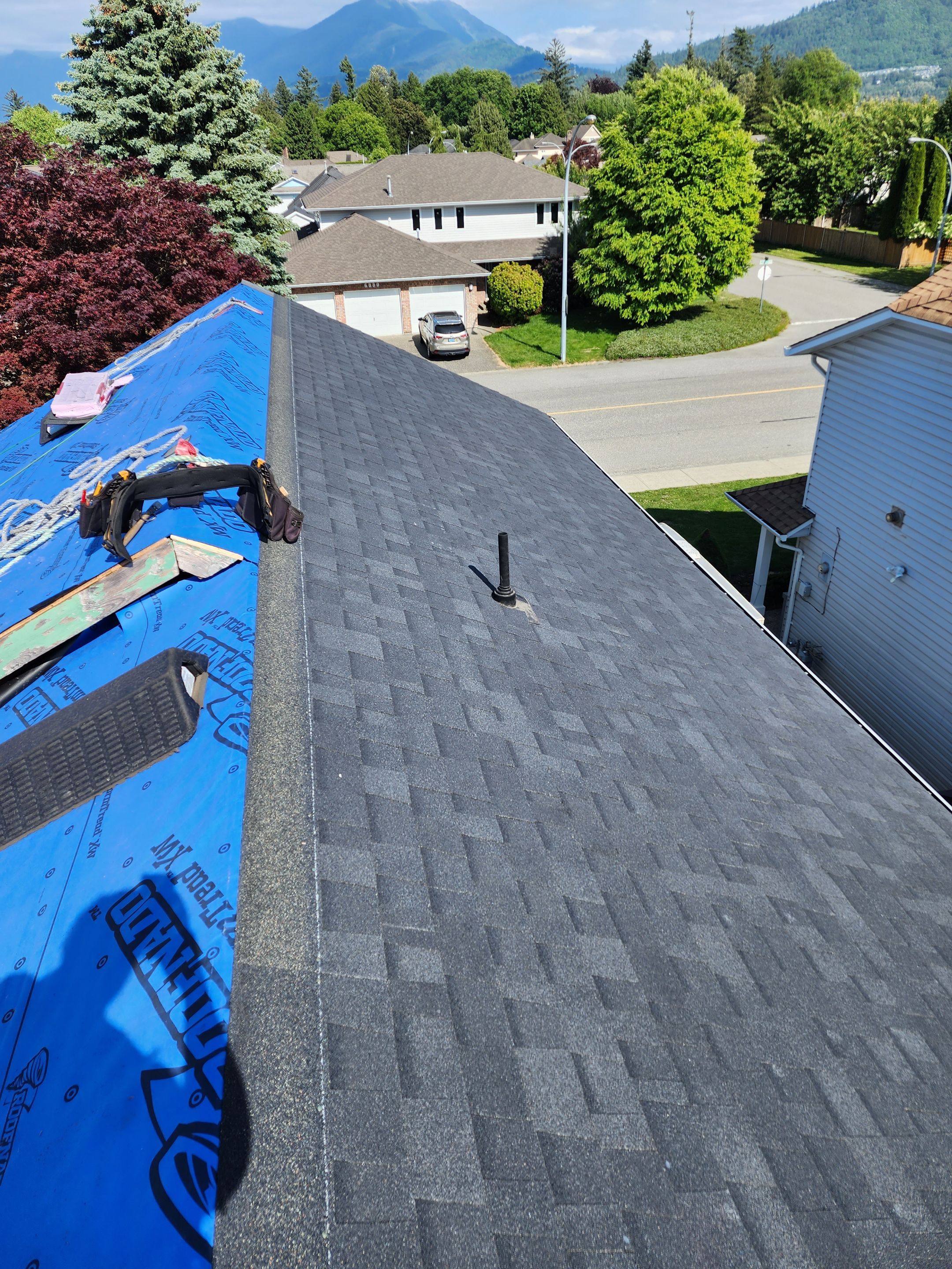 Residential Cedar ReRoofing Installation using OC Oakridge shingles by Top Notch Roofing Inc