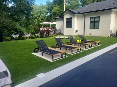 High-End Residential Turf Surrounding Pool in Powell