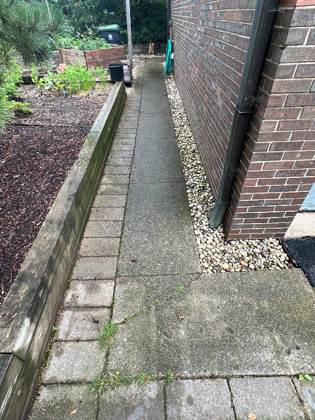 Aggregate and natural stone patio cleaning by Northern Power Washing LLC.