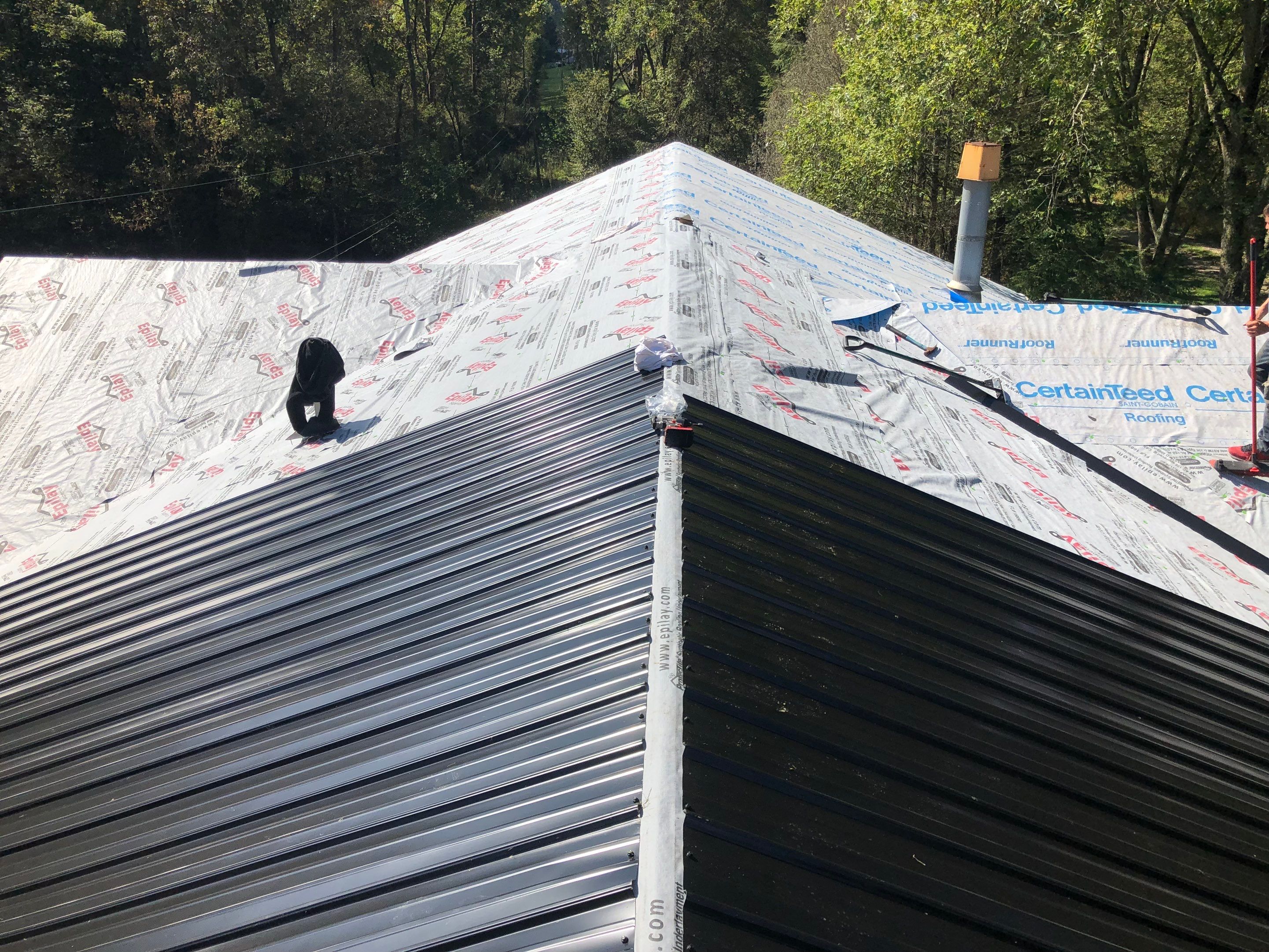 Metal Roof and Vinyl Siding, Soffit, Gutters using LifeTite Premium metal roofing  by Secure Construction Company Inc
