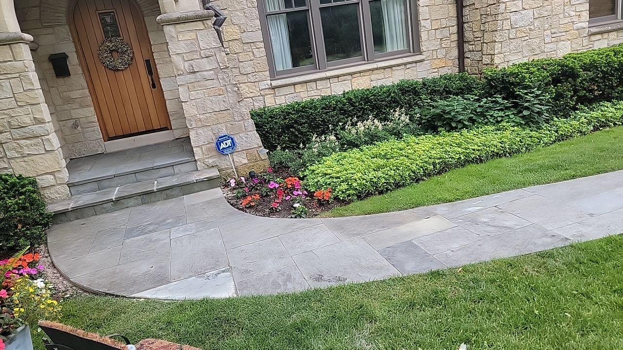 Northbrook, IL stucco home soft wash and stone cleaning by Northern Power Washing LLC.