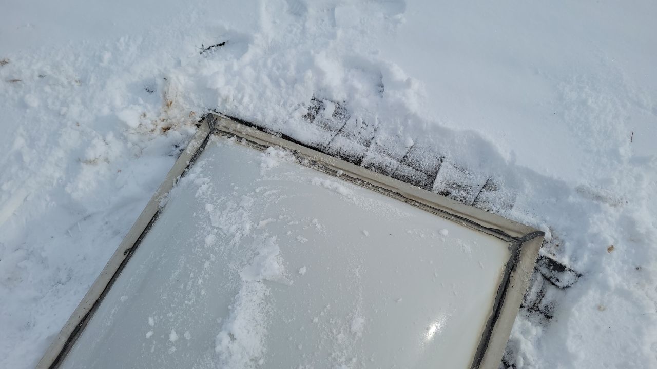 Skylight Removal using Shingle Repair by The Roof Doctor