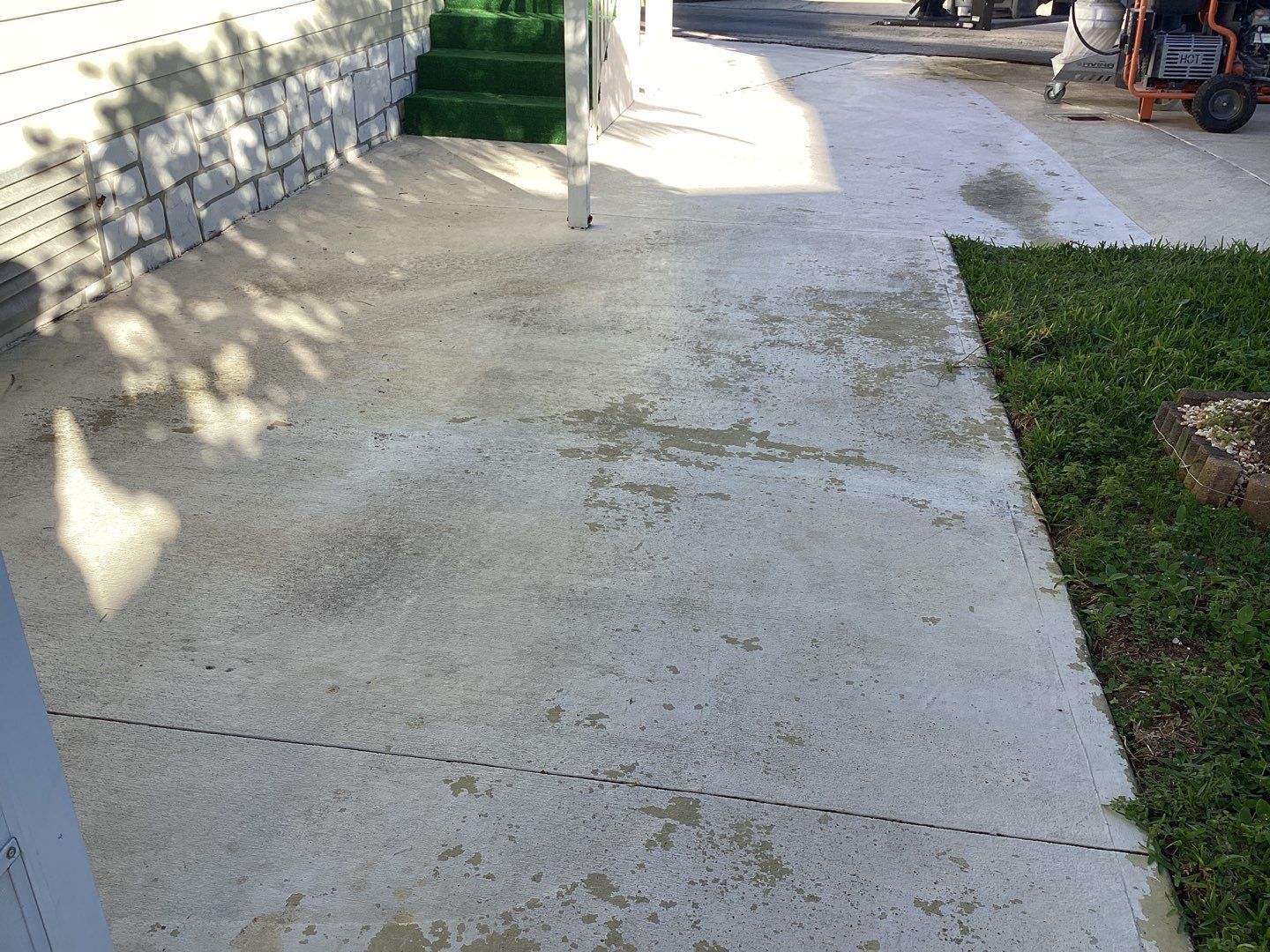 Driveway using Mt Everest by Amvet concrete coatings llc