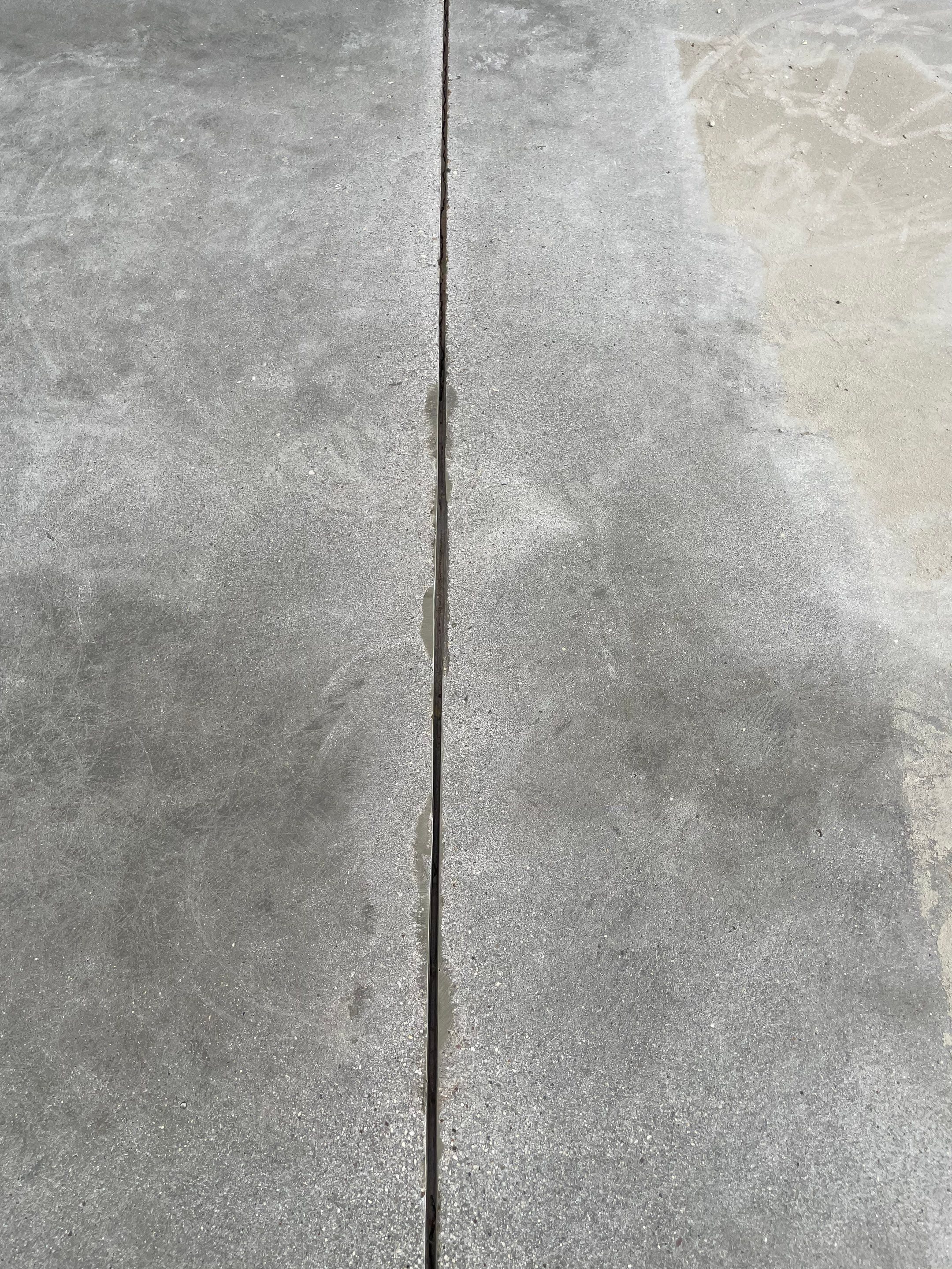 Sioux Falls Garage Floor Transformation with Cabin Fever Decorative Chips by Select Painting, Coatings & Garage Cabinets