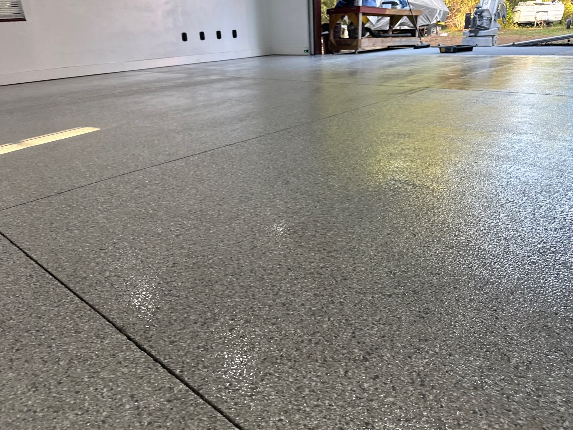 Garage Project in Mount Everest by Cross Creek Concrete Coatings