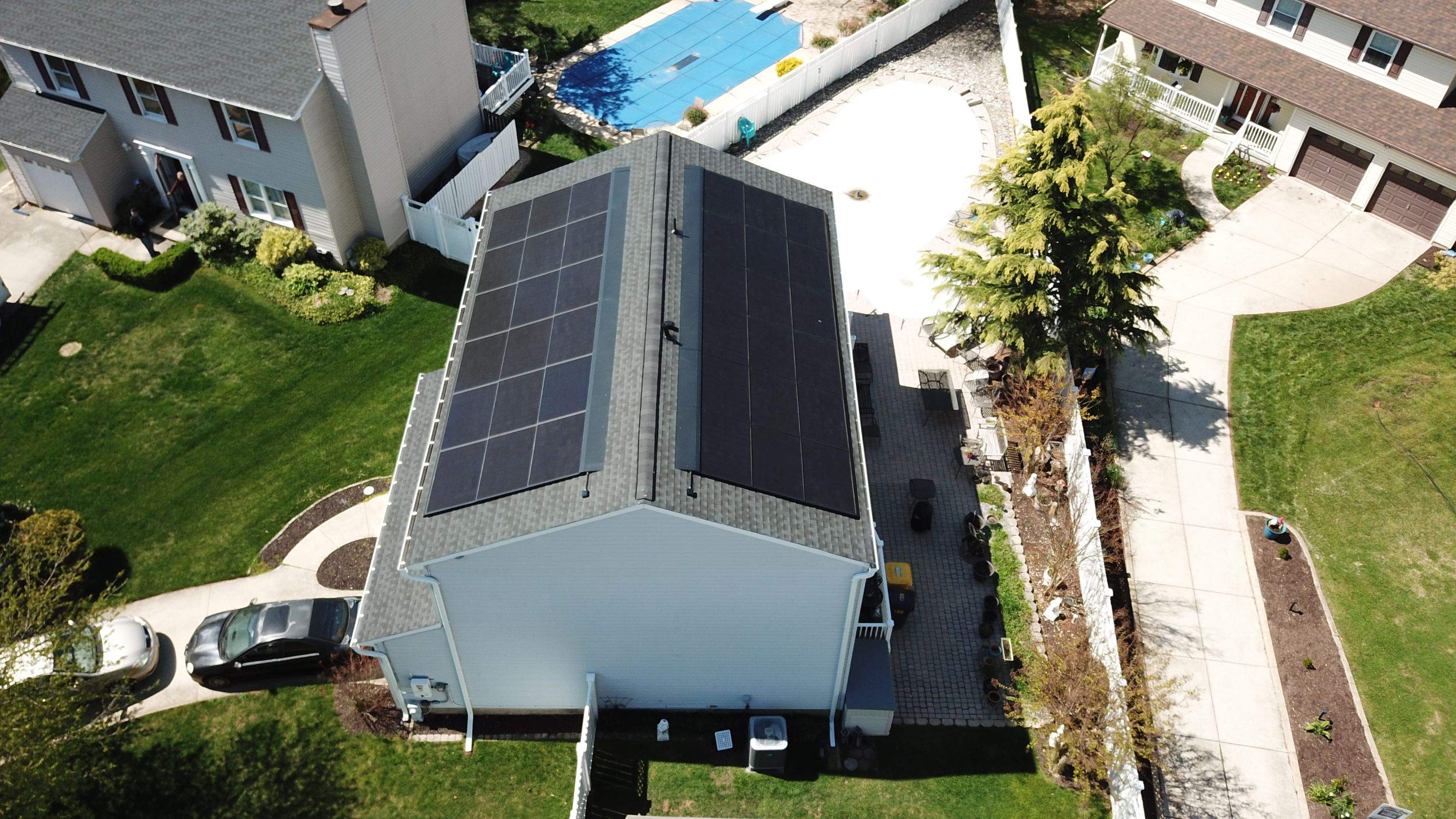 Roof Replacement with GAF Decotech integrated solar panels by American Home Contractors