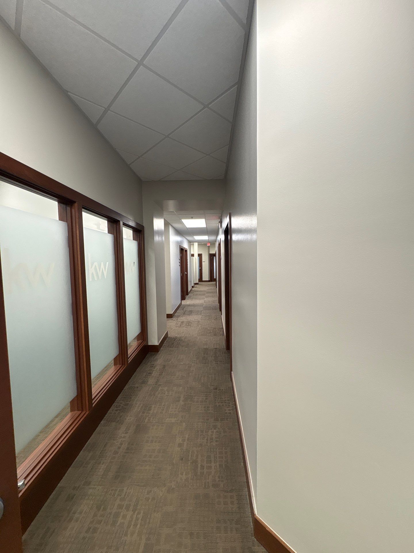 Commercial Office Interior Remodel and Modern Suite Refresh in Sioux Falls by Select Painting, Coatings & Garage Cabinets