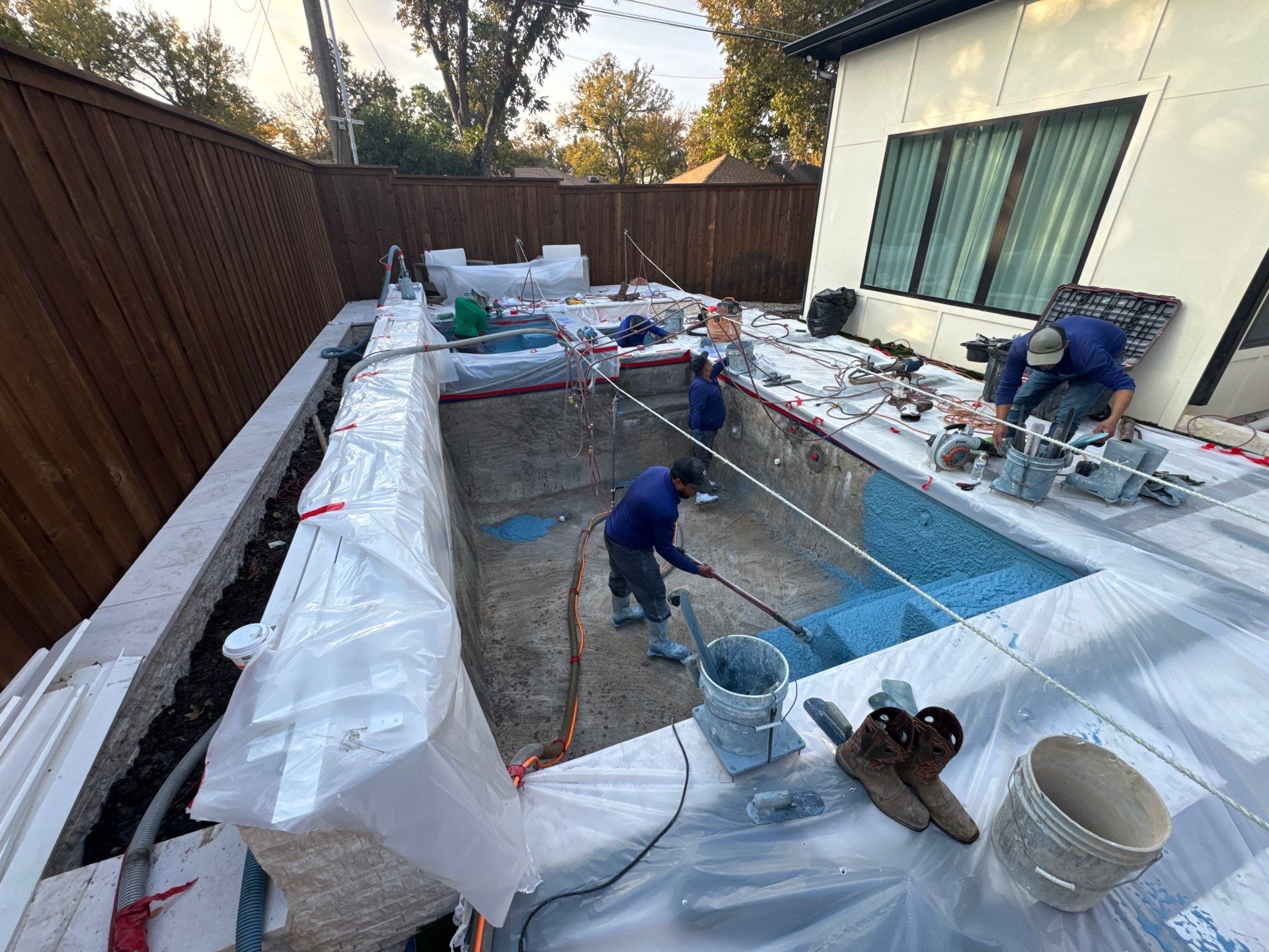 Modern Geometric Pool and Spa with Turf-Strip Decking by Pinnacle Pools and Spas - DFW