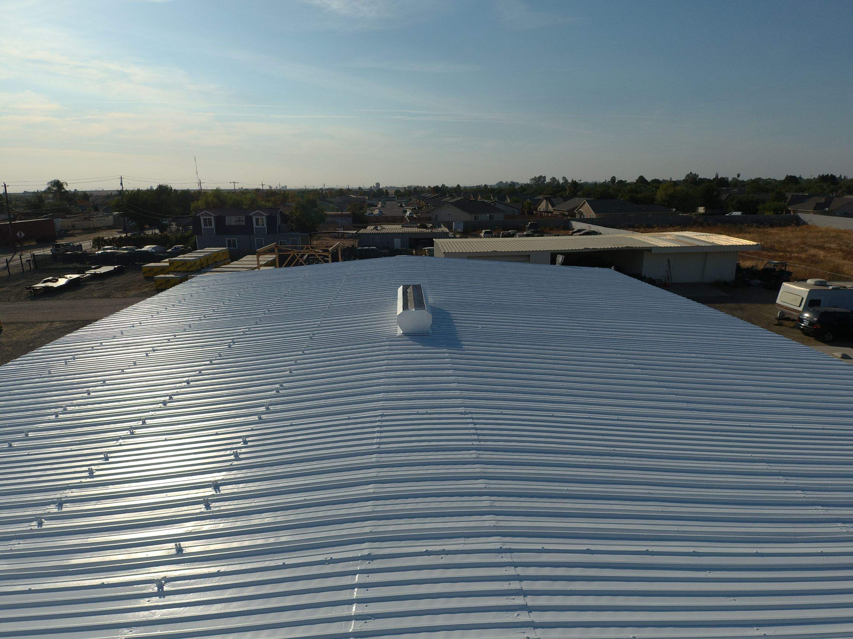 Metal Restoration Roofing system with Benchmark/PUMA XL 20 yr warranty by Straight Edge Roofing Inc