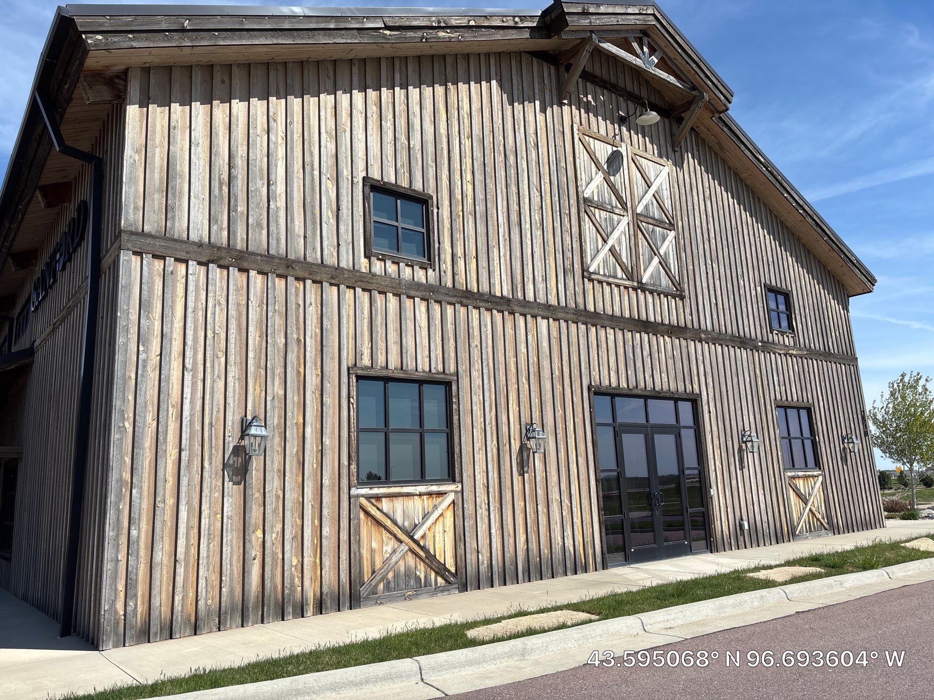Commercial Exterior Wood Staining for Sanford Barn in Sioux Falls by Select Painting, Coatings & Garage Cabinets