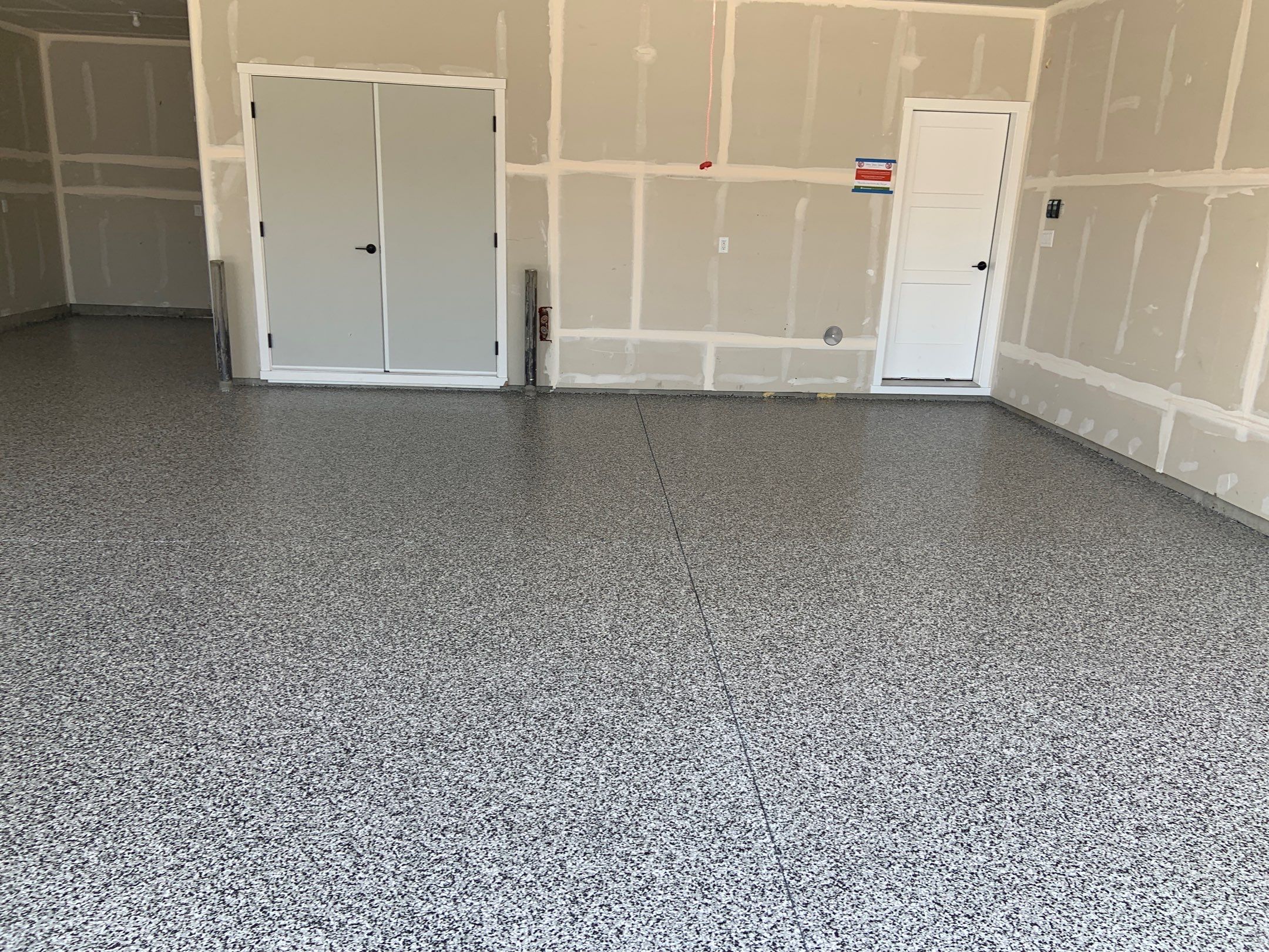 Garage Transformation using Domino by Croc Coatings, LLC