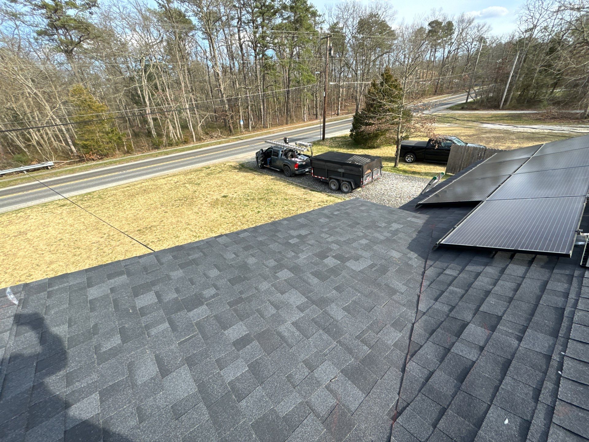 Onyx Black Shingles by Reimagine Roofing