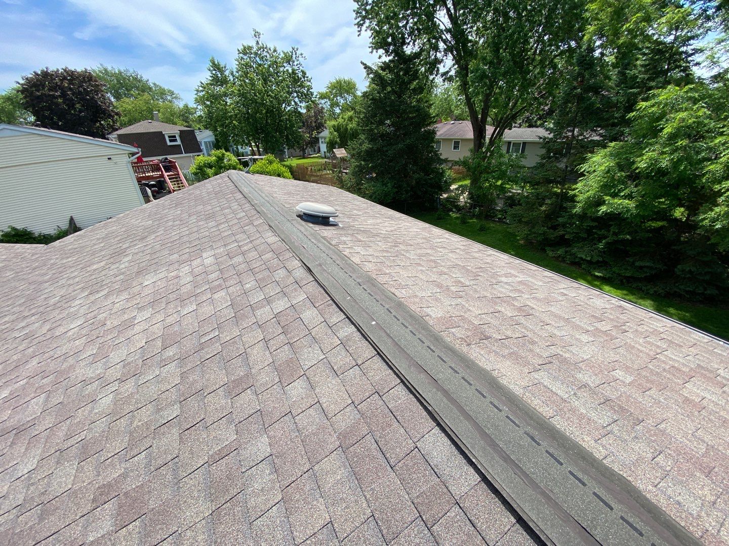 Asphalt Roof Replacement by Custom Installations