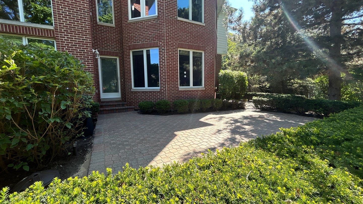 Brick paver repair, clean and seal by Northern Power Washing LLC.
