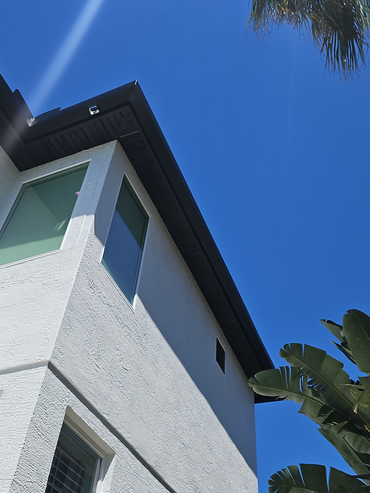 Soffit and Fascia Installation and black seamless gutters in Sarasota FL by Gutter Professors