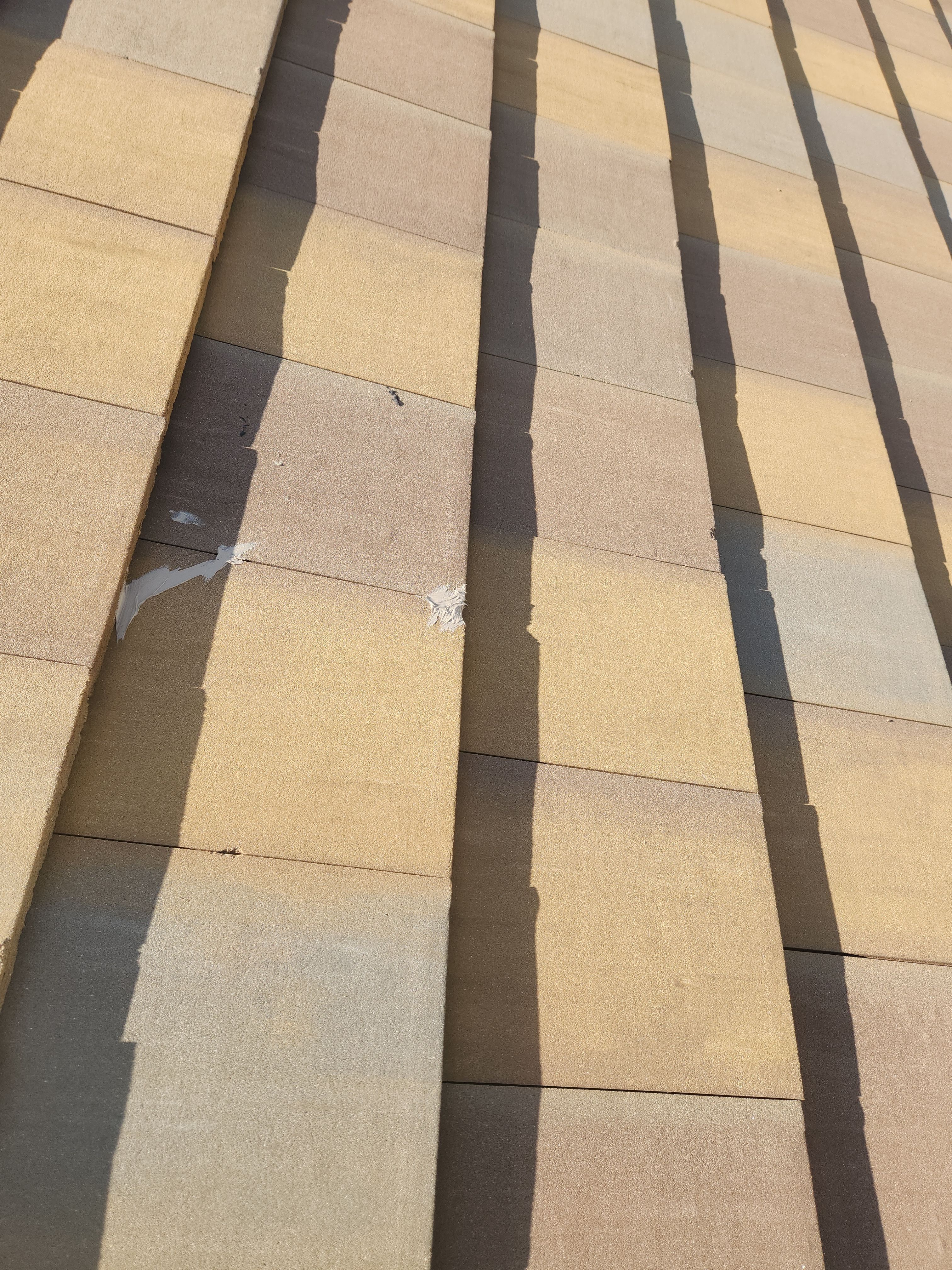 Concrete Tile Roof Repair for Residential Home in Wellington by Aastro Roofing