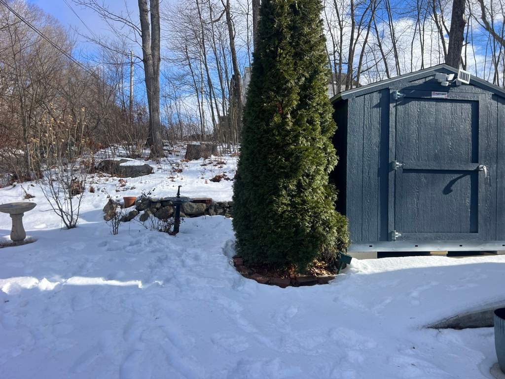 New White Vinyl picket fence with matching gate by DiGiorgi Roofing and Siding Inc