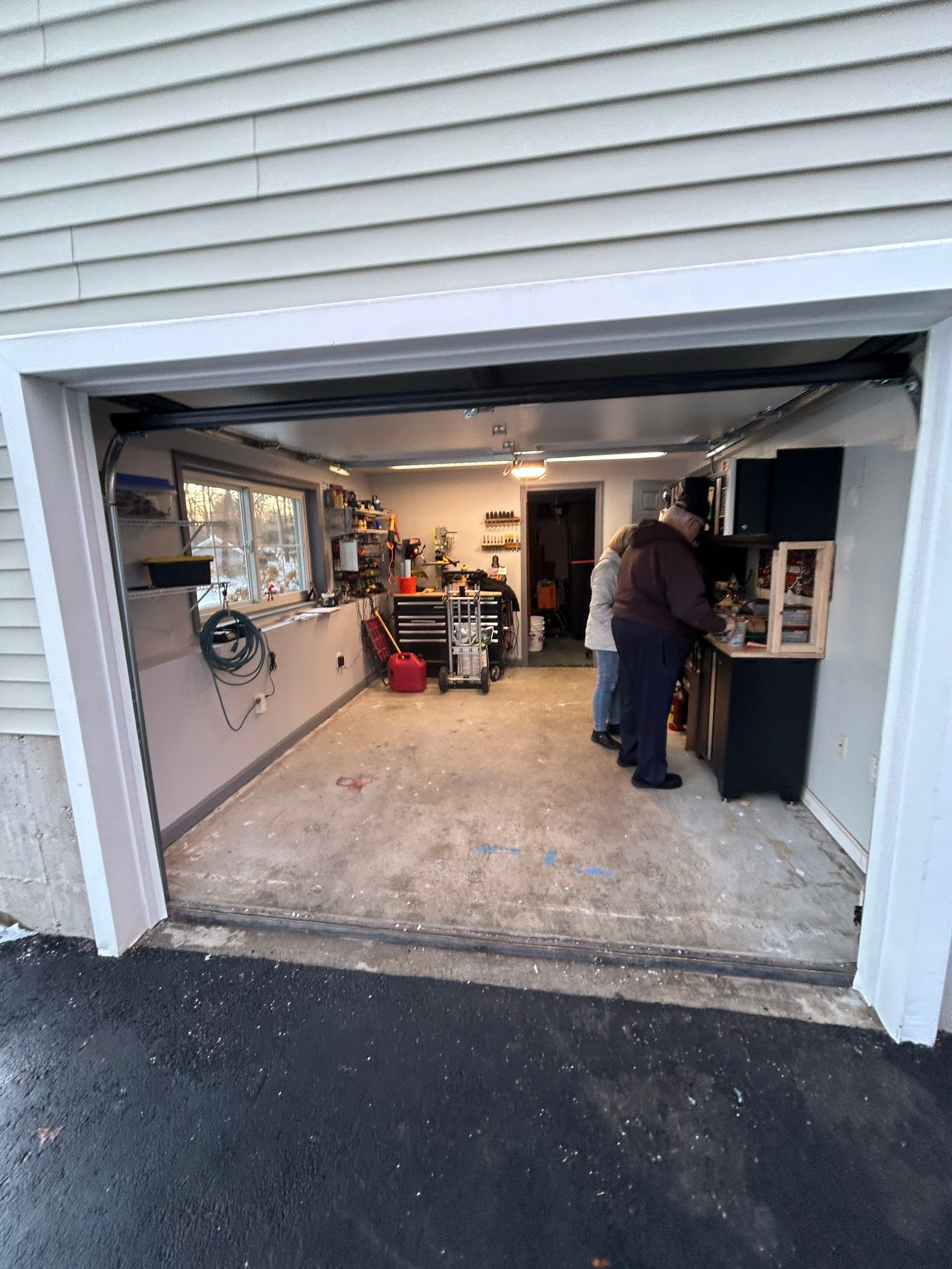 Garage Door Upgrade with Added Light & Detail by DiGiorgi Roofing and Siding Inc