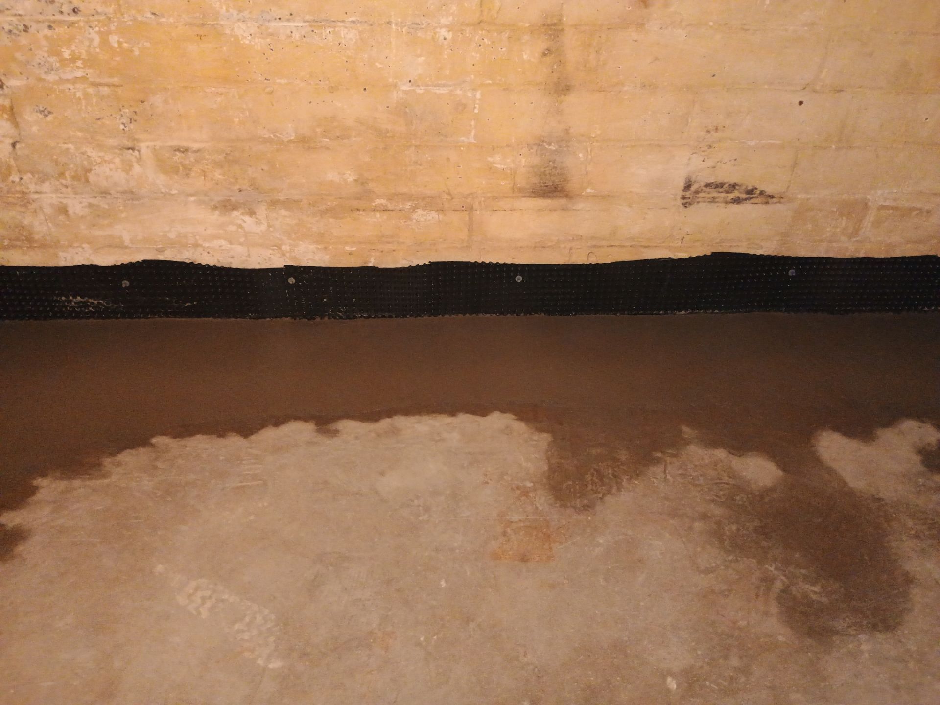 Interior Drain Tile for a South Minneapolis Basement by Waterproofing Northeast
