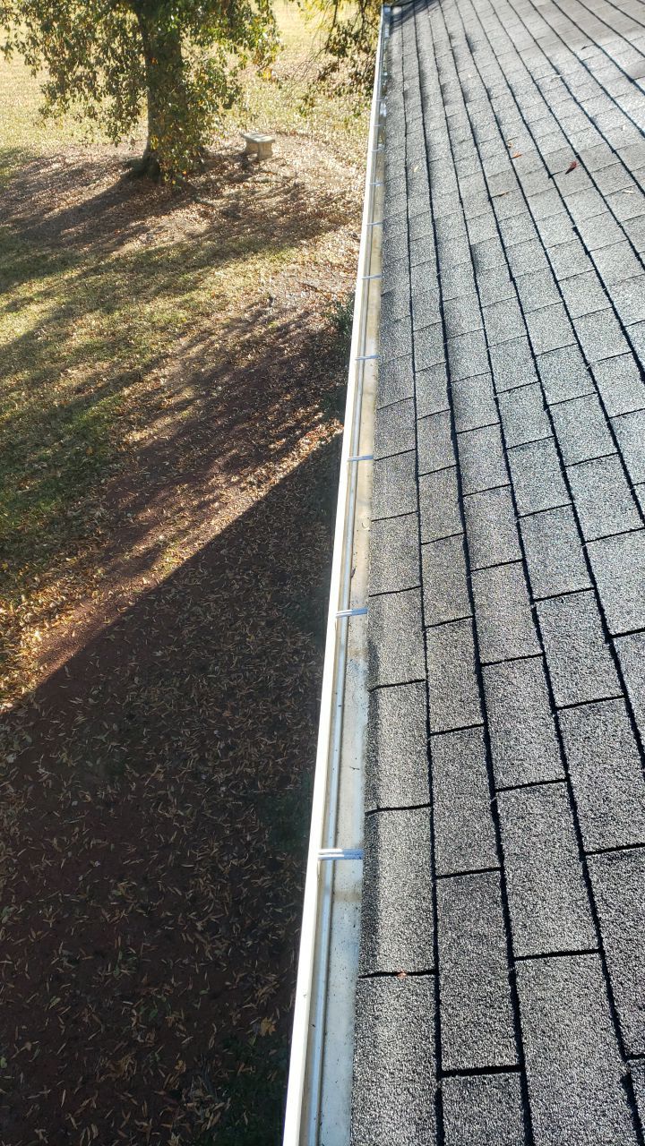 gutter cleaning and house wash and gutter guard installation by Power Wash Masters LLC