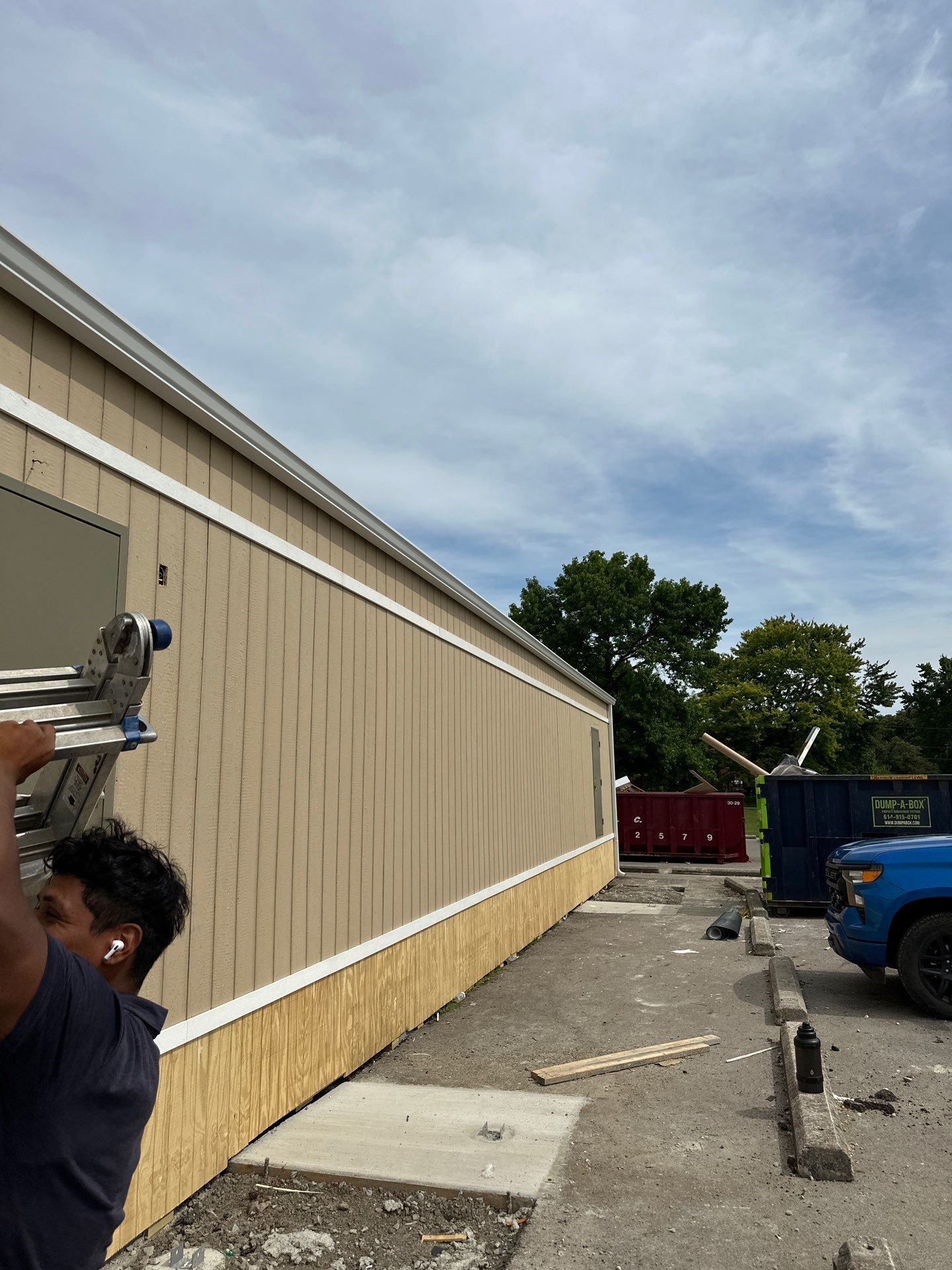 Commercial Flat Roof and Siding by Nitro Roofing and Construction