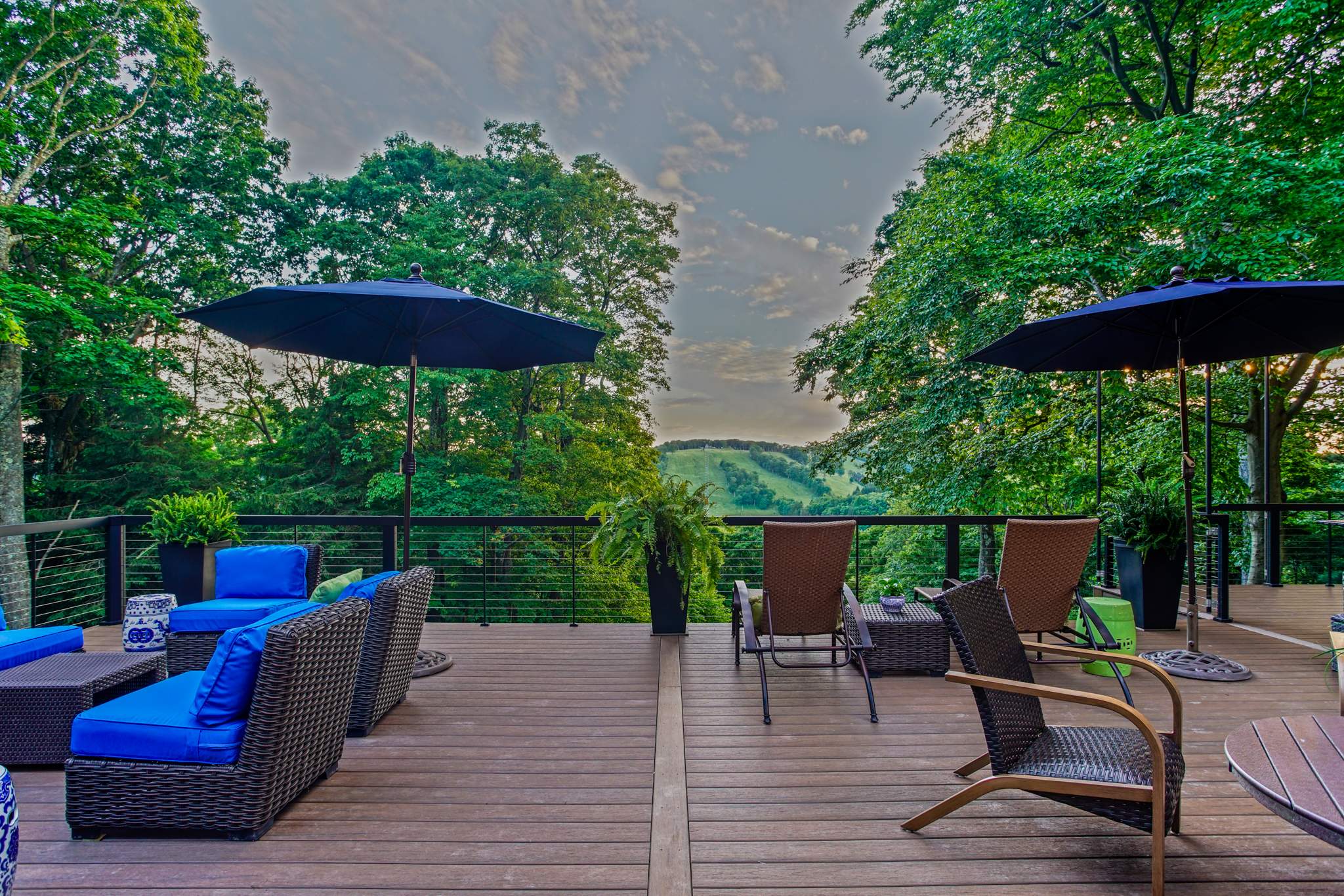 1500 sq/ft Composite Deck Build with Outdoor Kitchen in Champion by Cousins Roofing Siding & Decks