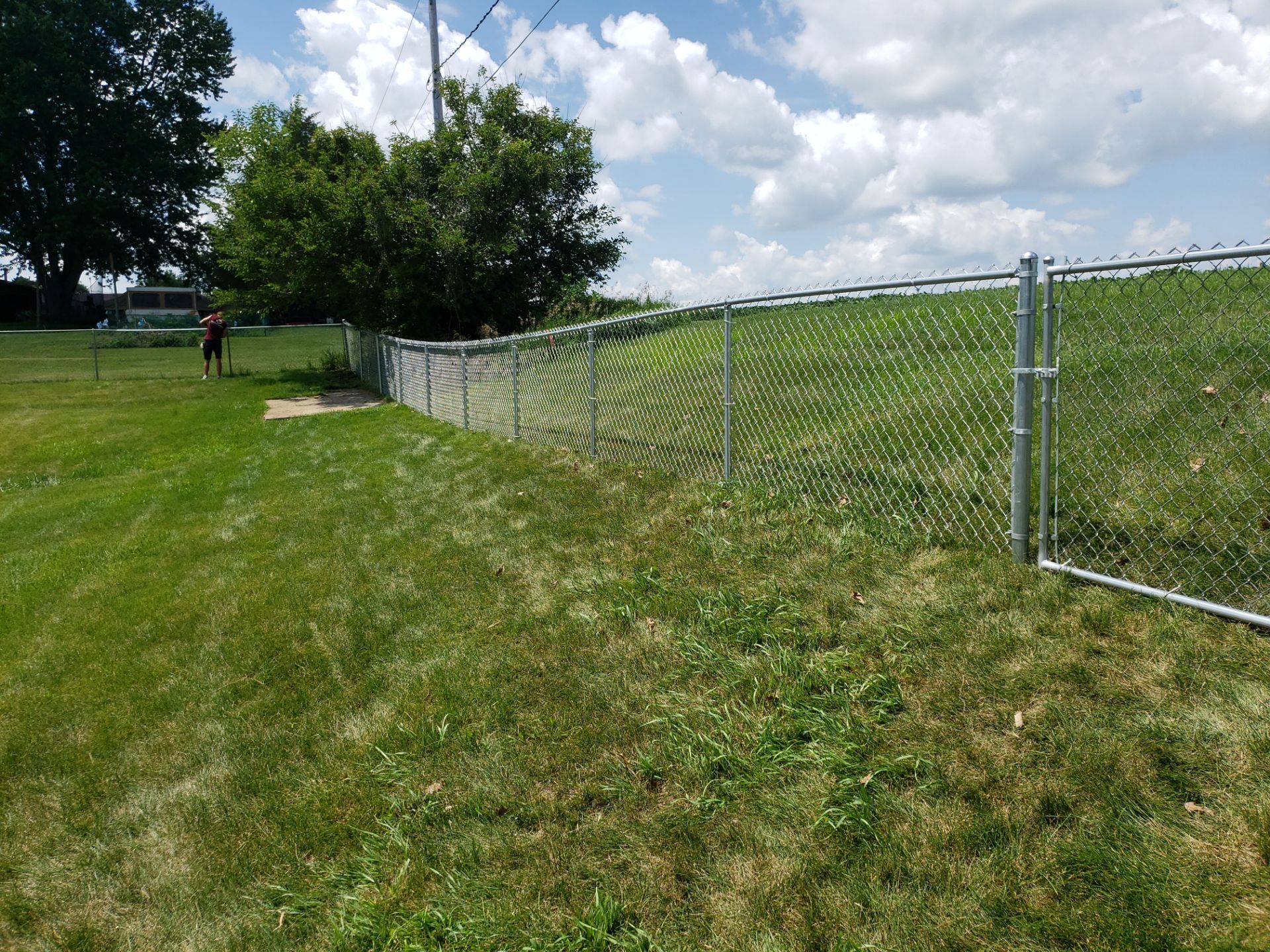 Hudson Residential Chain Link Fence and Pedestrian Gate Installation by Perfect Picket Fence and Stain