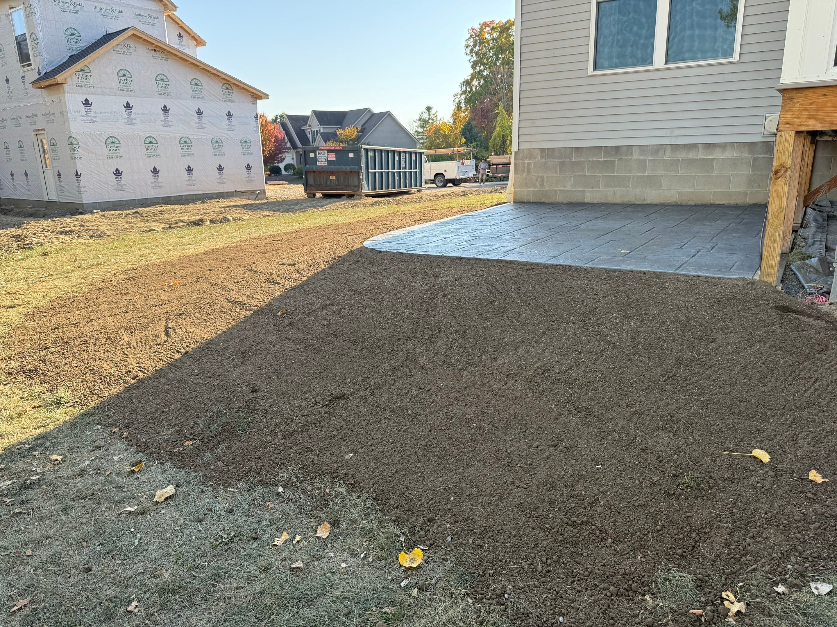 Stamped English Rivenstone concrete patio and sidewalks  by NG Masonry & Construction LLC