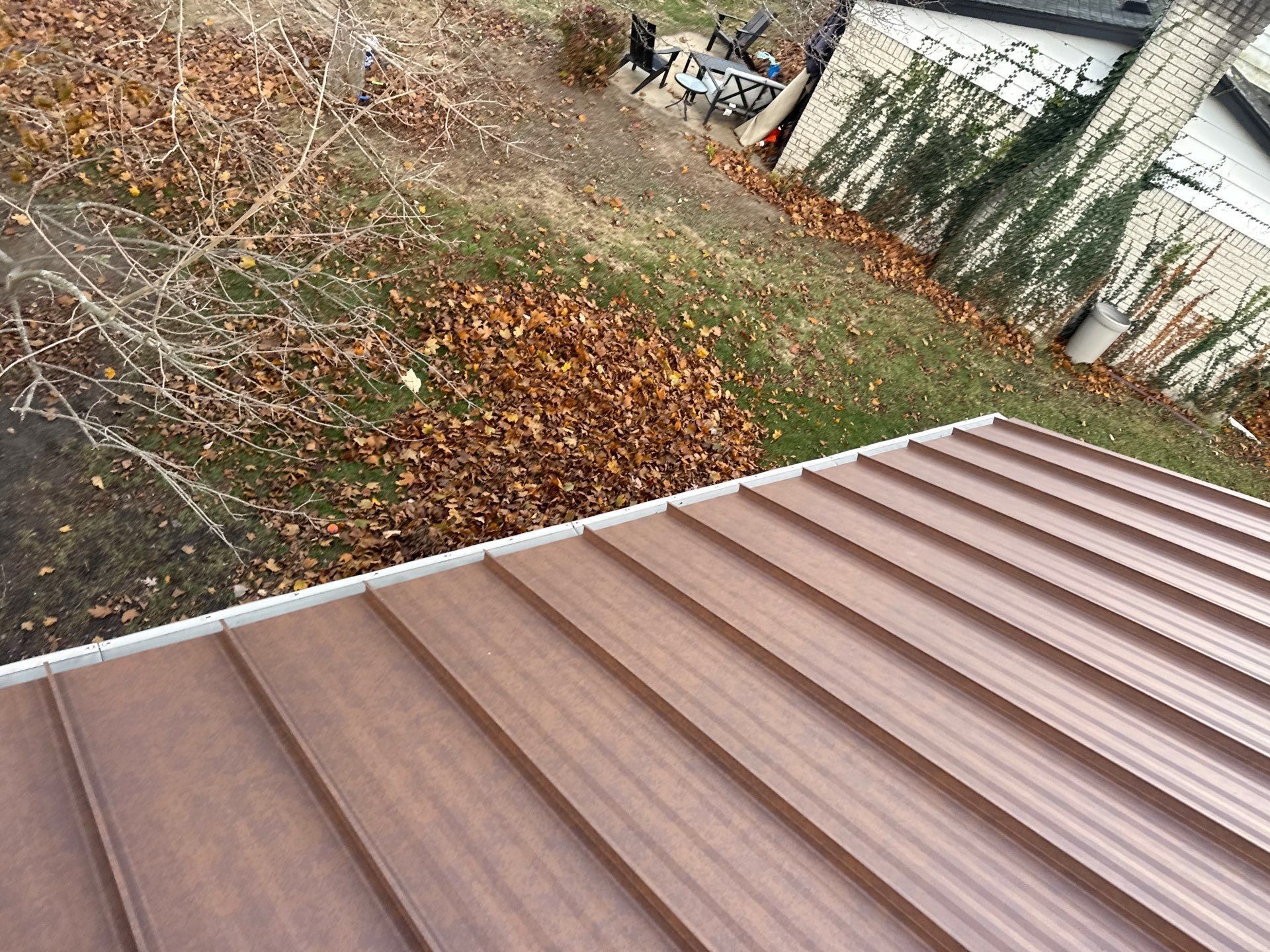 Roof Replacement using MS Standing Seam Roof Western Rust by 180 Contractors