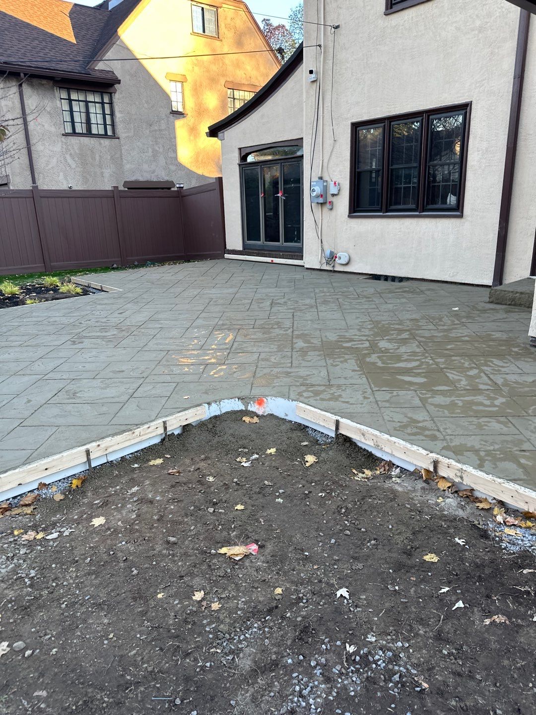 Majestic Ashlar stamped concrete patio  by NG Masonry & Construction LLC