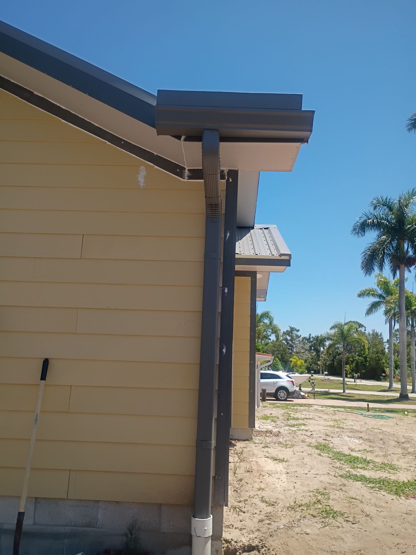 Musket Brown Seamless Gutters Installation in Saint James City, FL  by Gutter Professors
