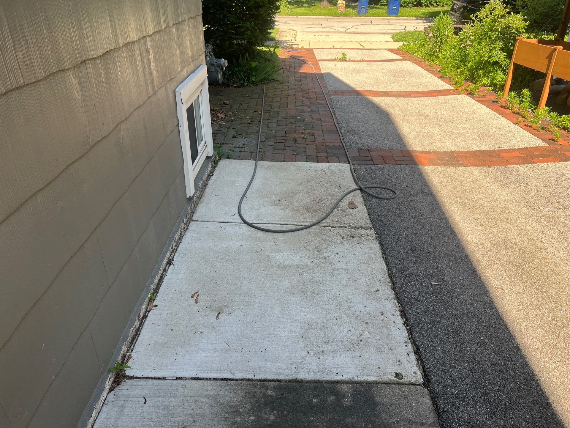 Brick paver cleaning and sealing by Northern Power Washing LLC.