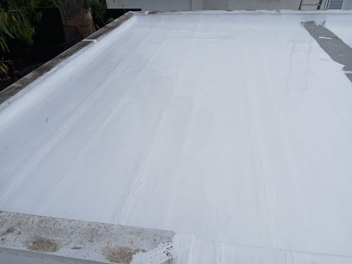 Silicone Membrane Installation using American Standard Coatings Silicone-S by Hull Brothers Roofing