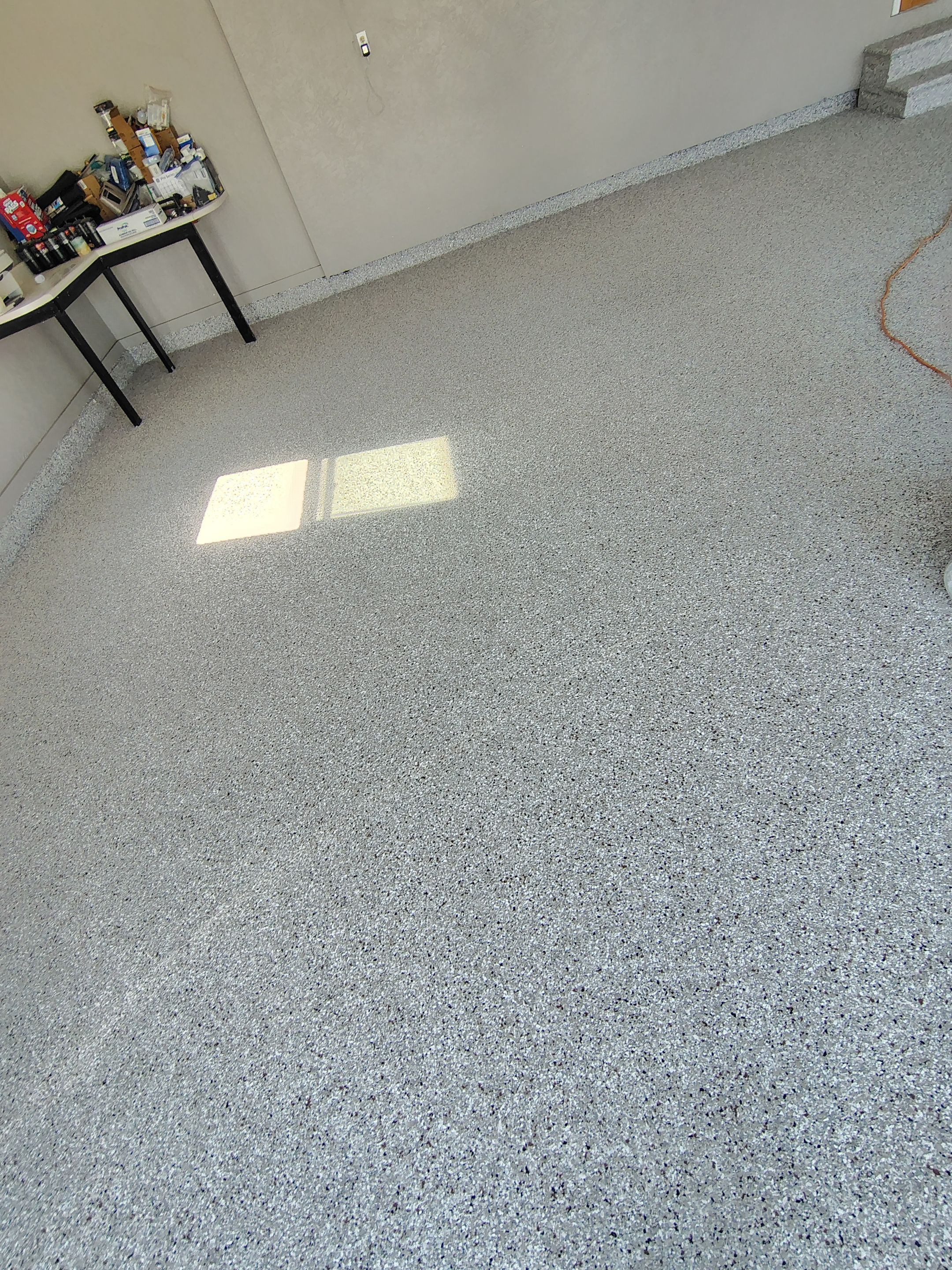 Garage Concrete Floor Coating and Crack Repair in Onawa by Select Painting, Coatings & Garage Cabinets
