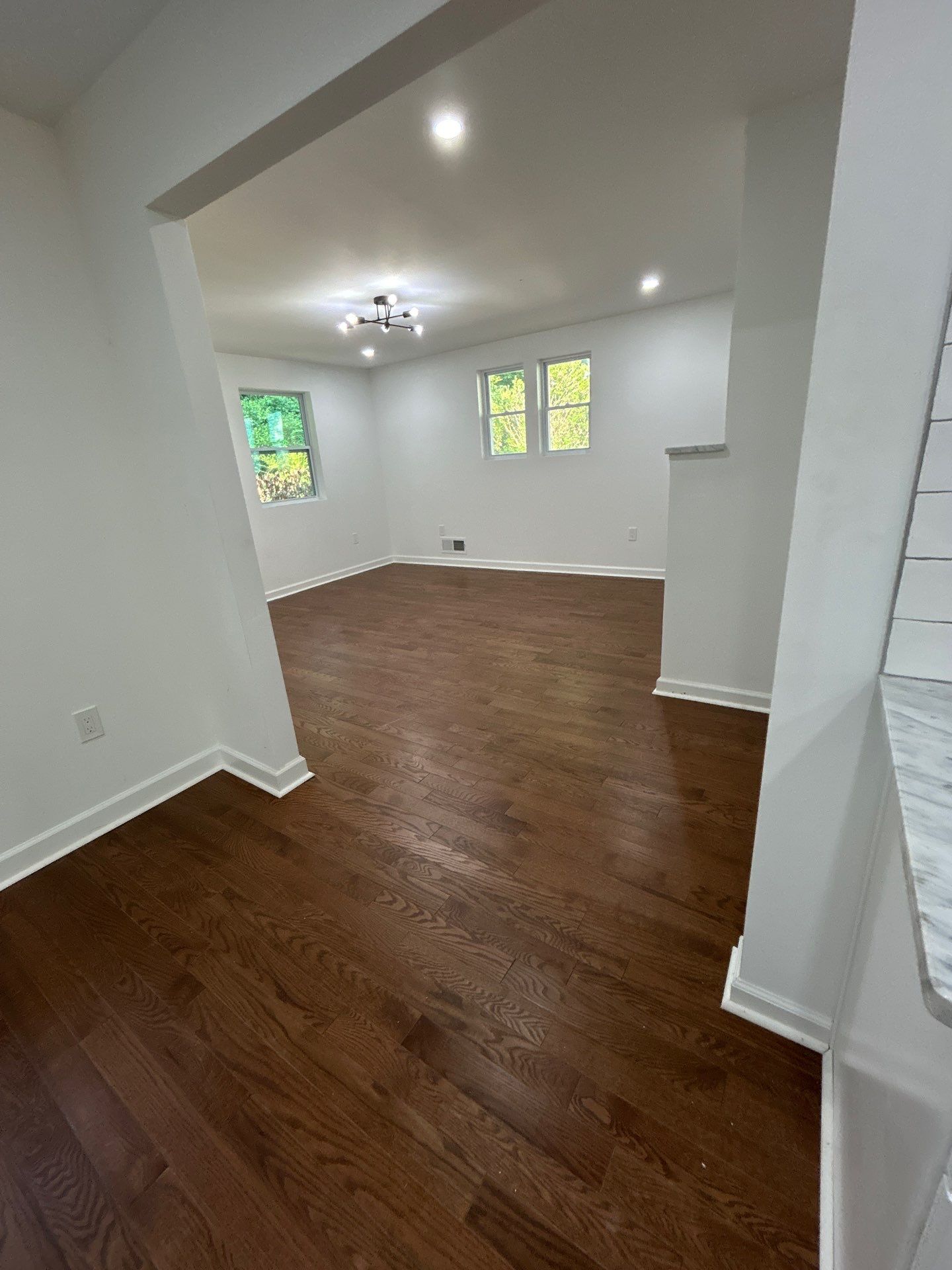 Replaced LVP with timeless solid oak by Footprints Floors of East Atlanta