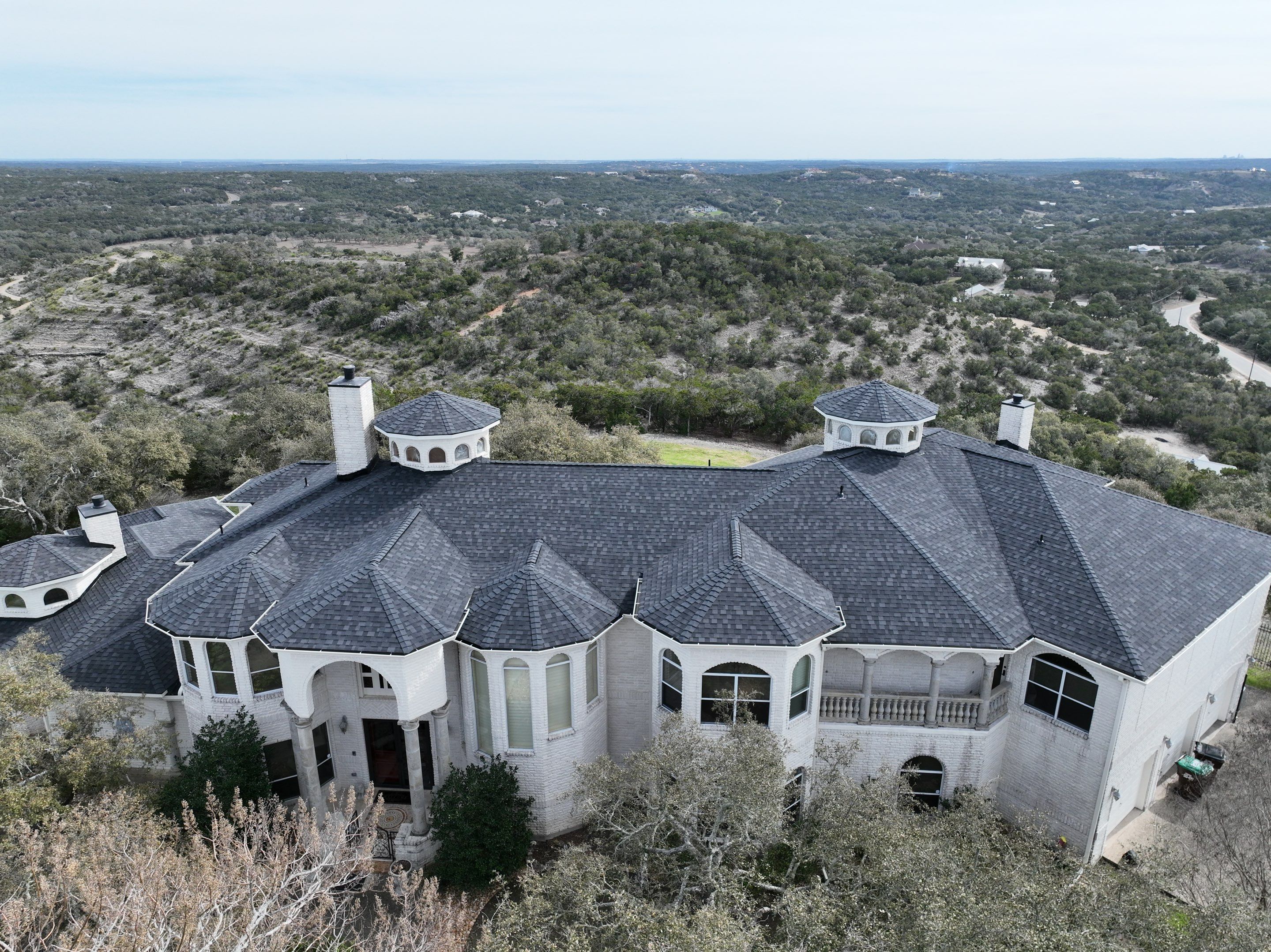 Residential Roof Replacement using 30 Year Laminate Shingles with High Profile Ridge by Premier Roofing and Contracting
