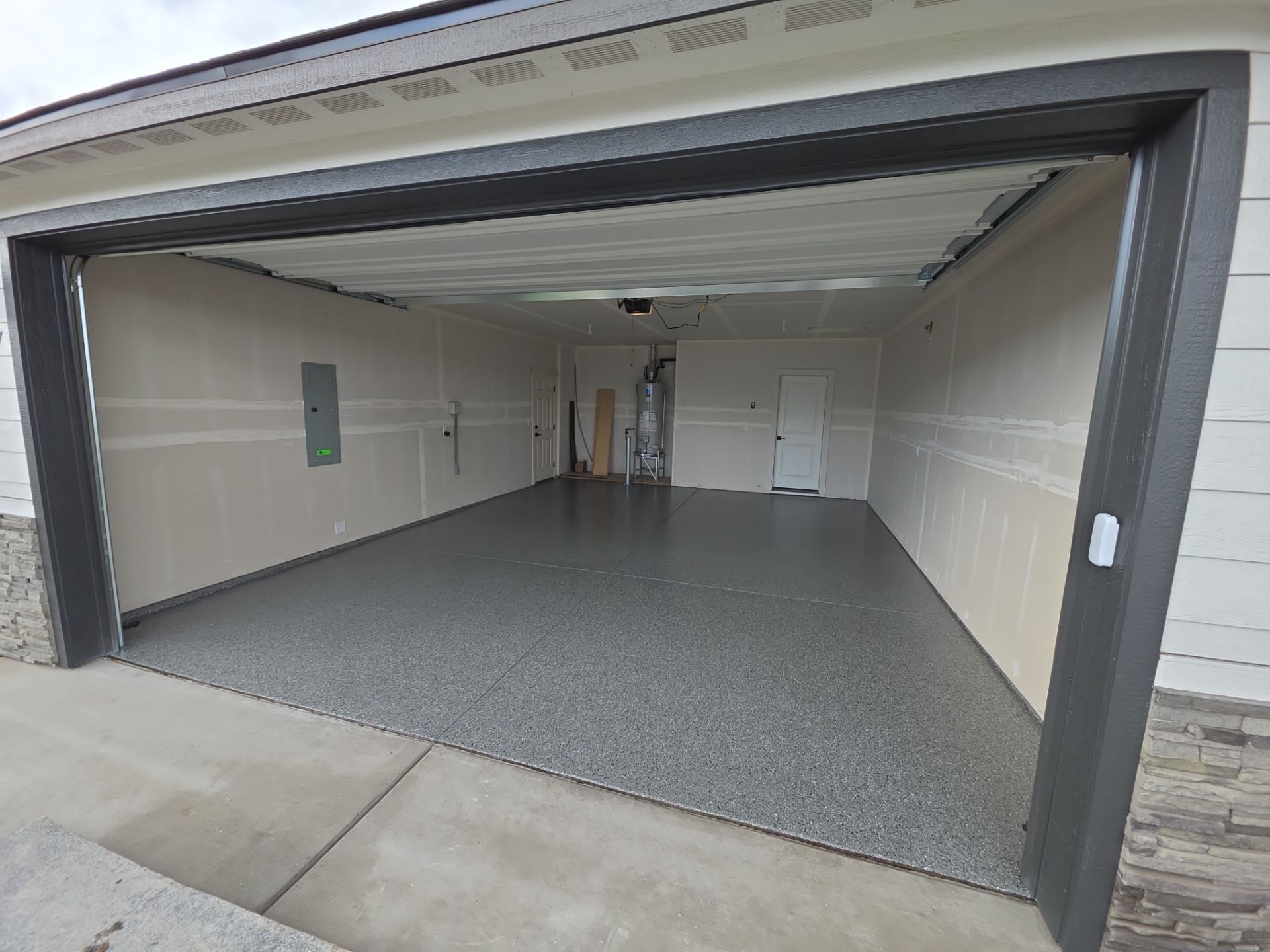 Garage Transformation using Slate Hybrid by Croc Coatings, LLC