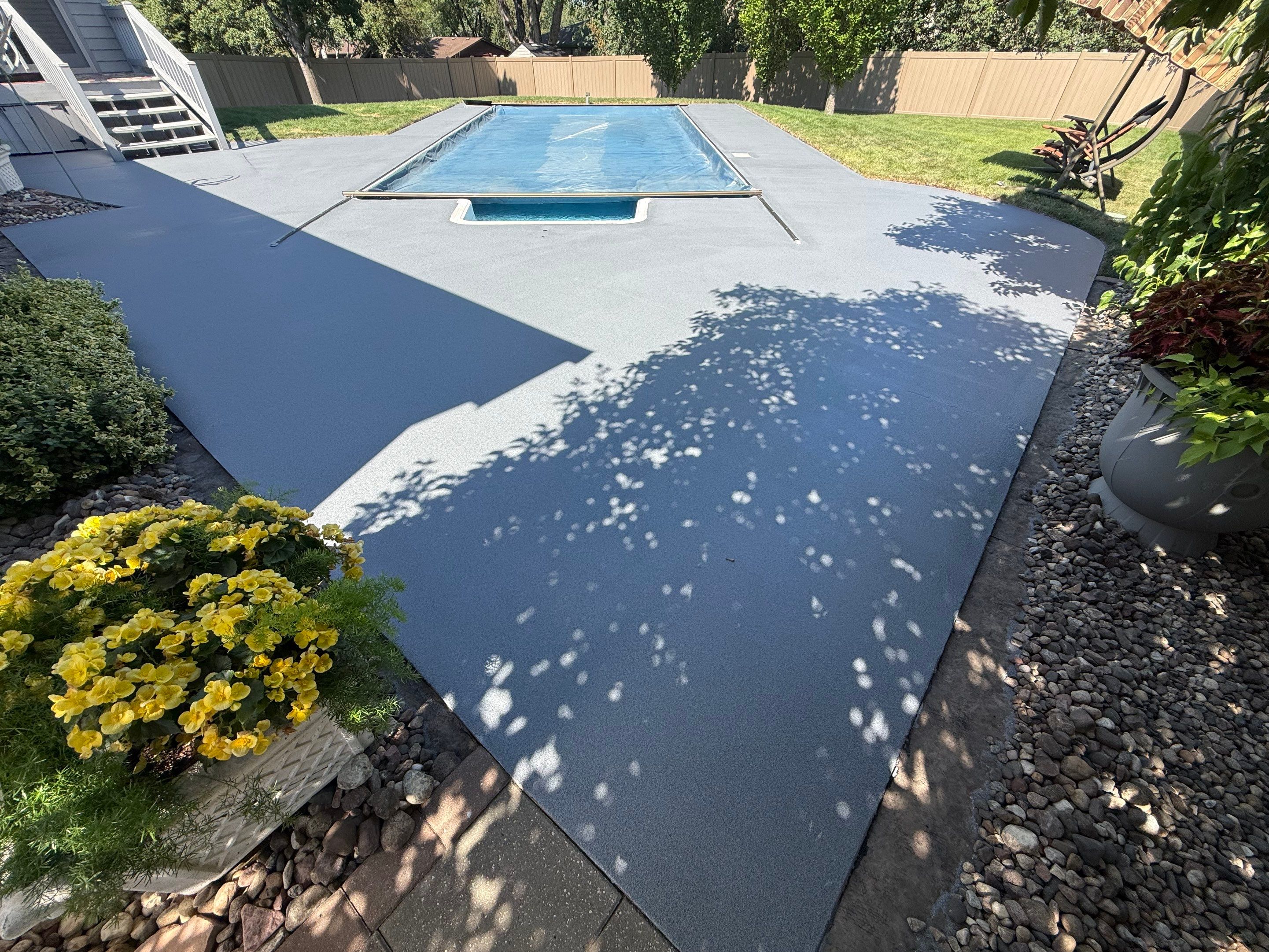 Residential Pool Deck Resurfacing in Sioux Falls by Select Painting, Coatings & Garage Cabinets