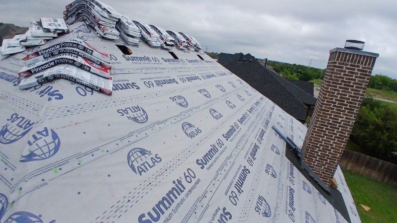 Residential Roofing Installation using ATLAS Pinnacle Pristine Shingles by Harvey Roofing & Construction